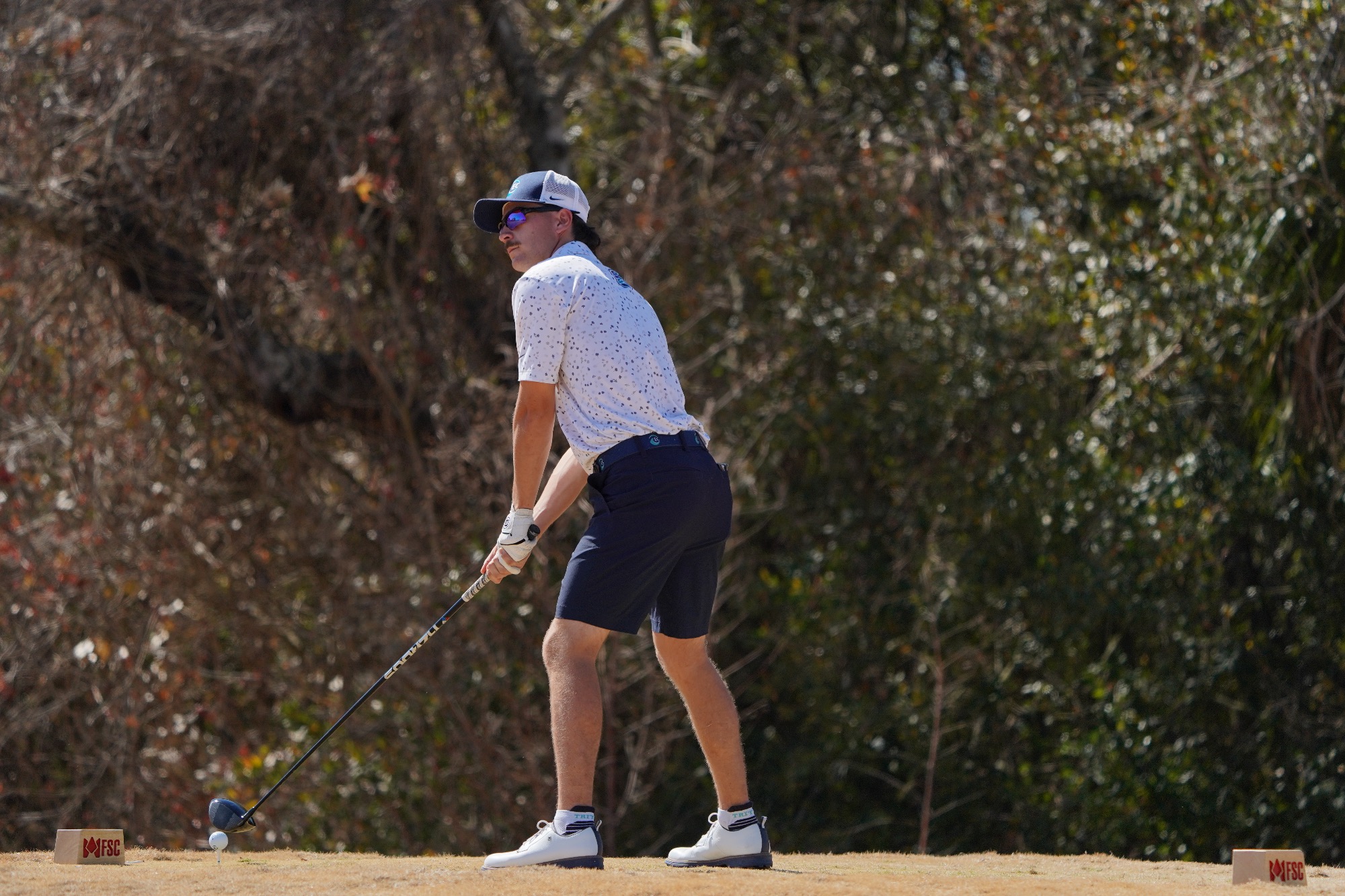 Player ready to drive ball