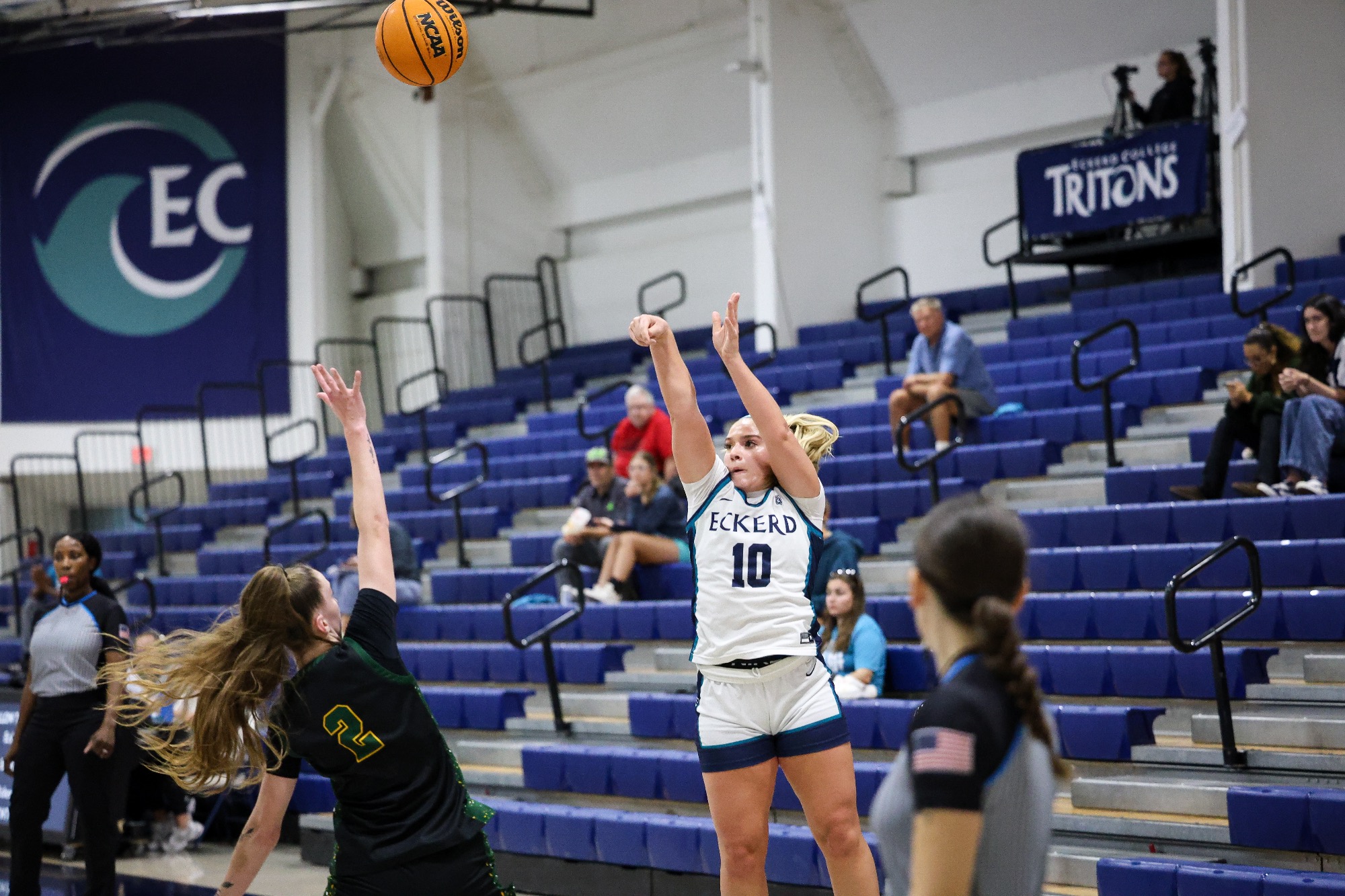 Player shoots three-pointer