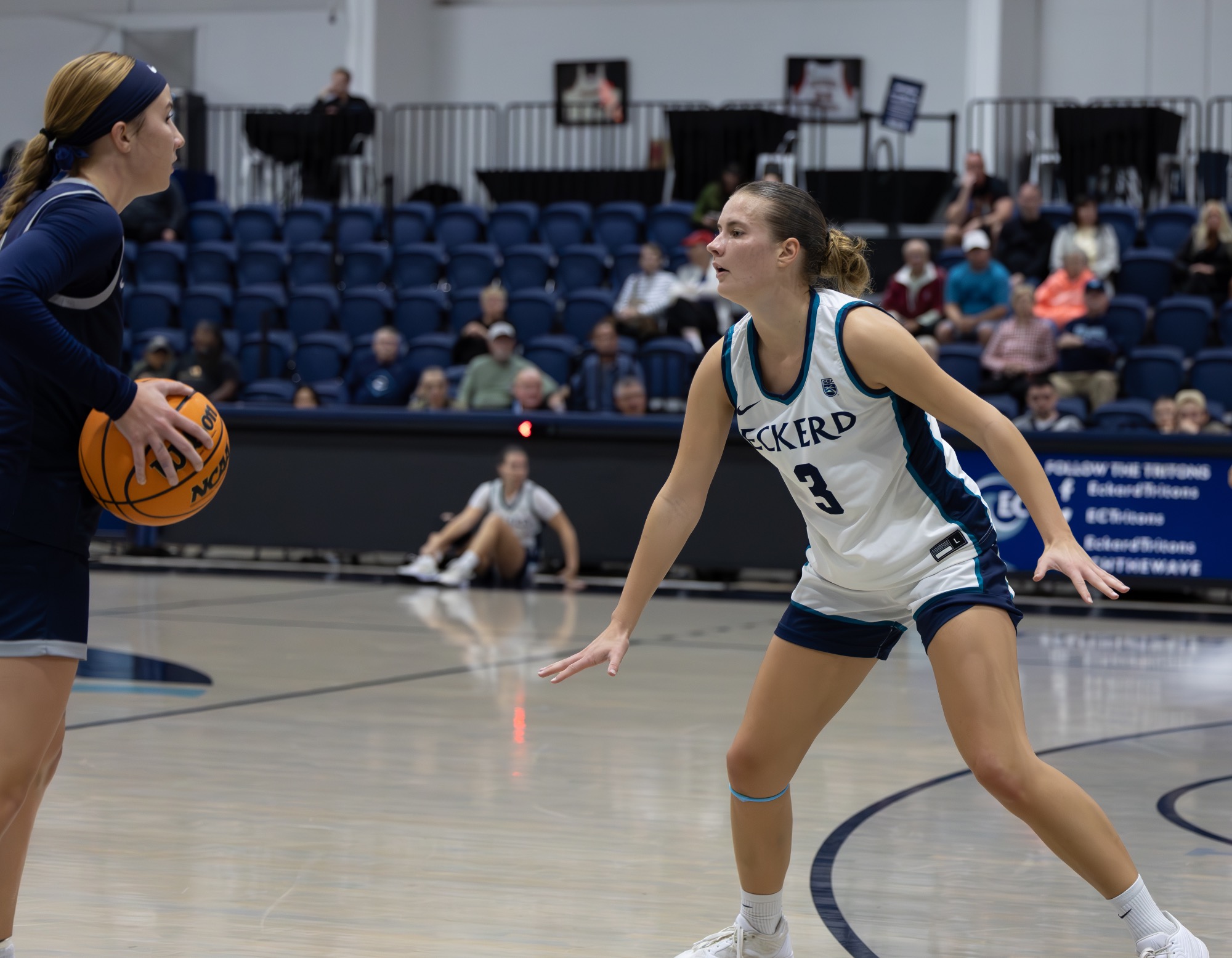 Defender watches opponent with ball