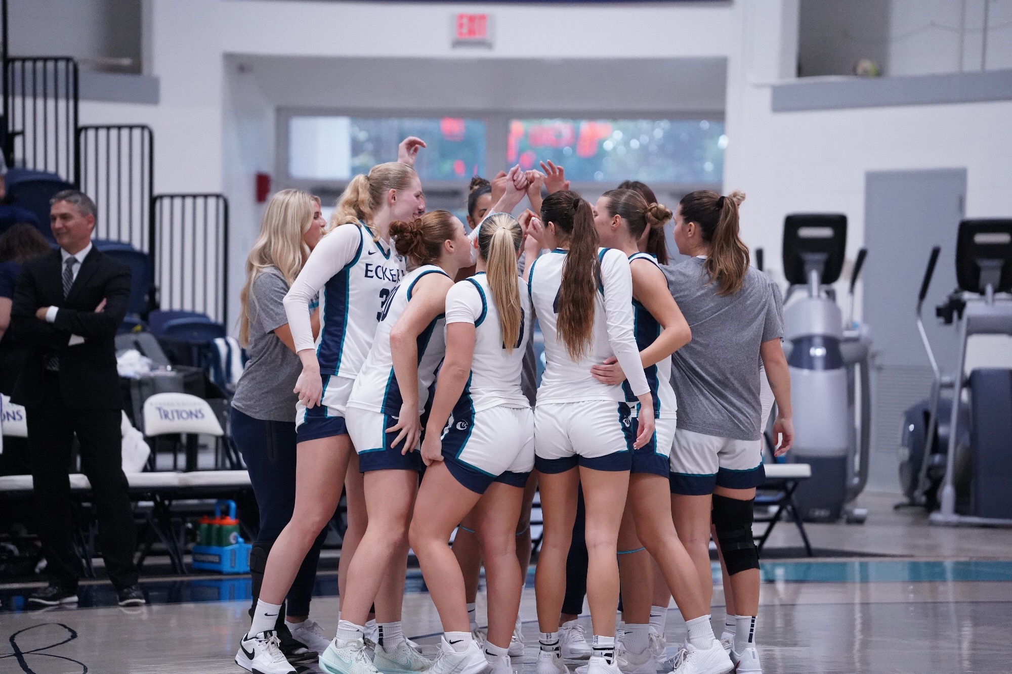 Team huddles before game