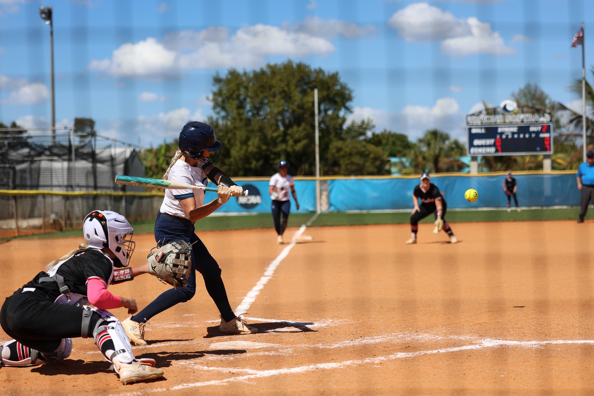 Player stands at plate holding bat