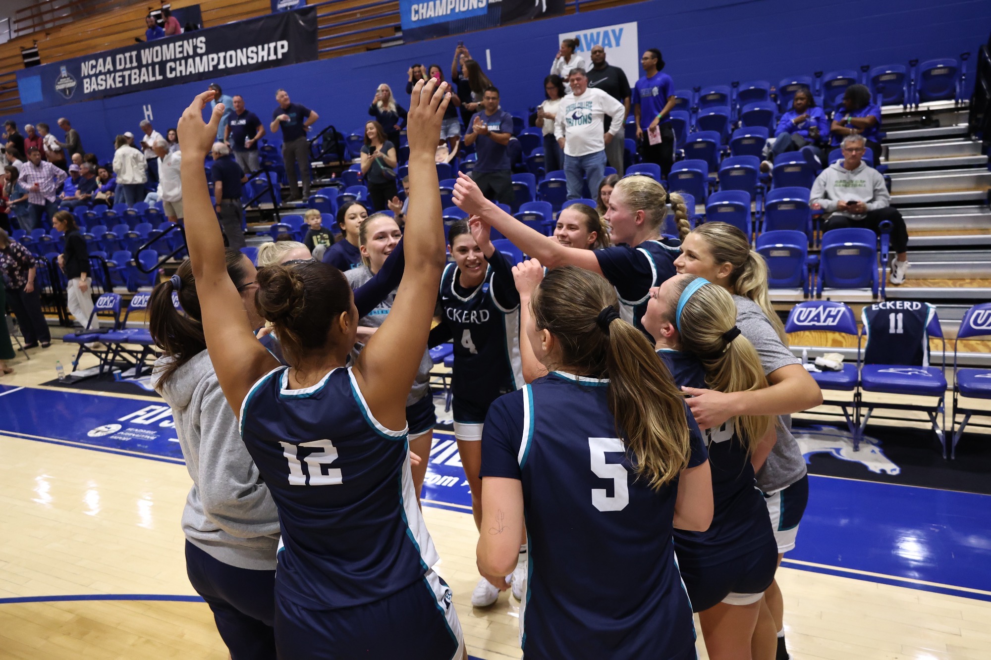 Players celebrate after win