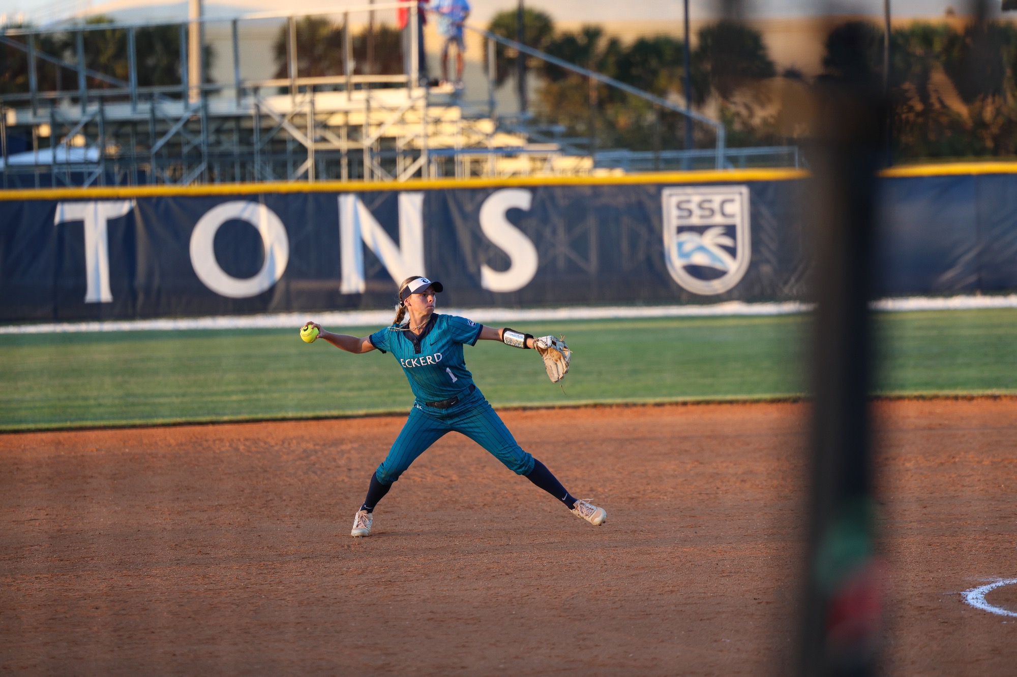 Player throws ball to first base