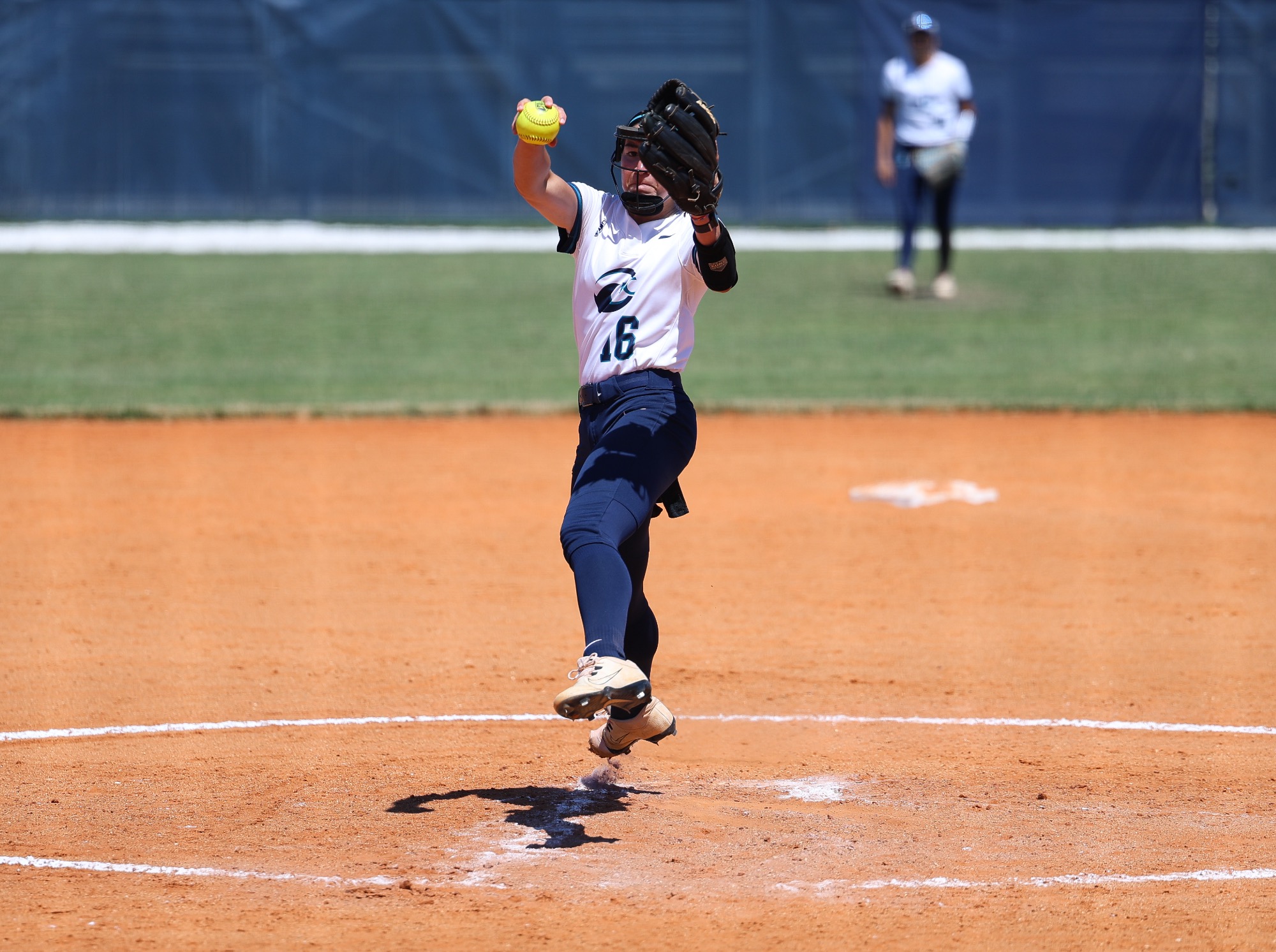 Pitcher pitches ball