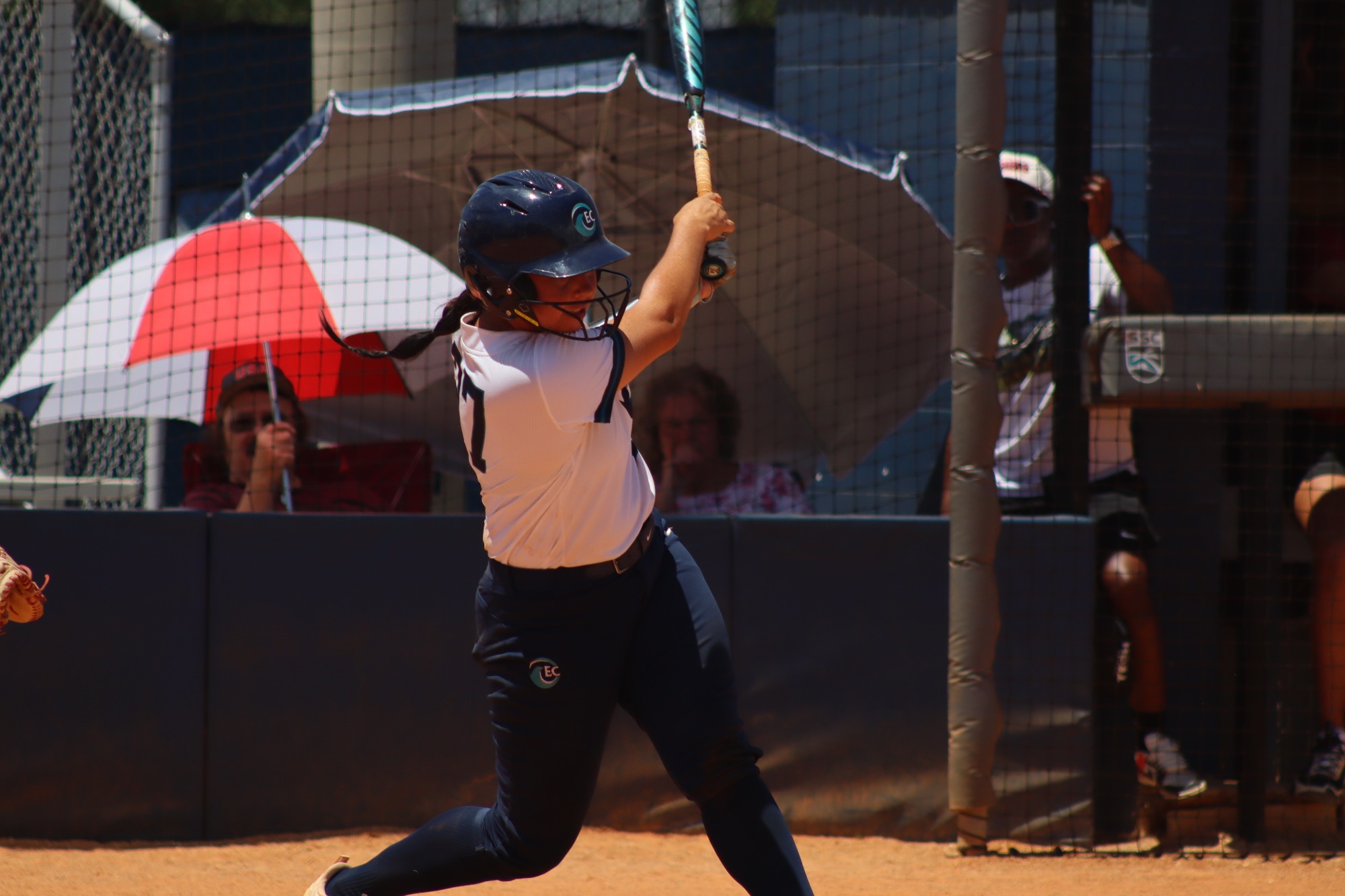 player swings bat