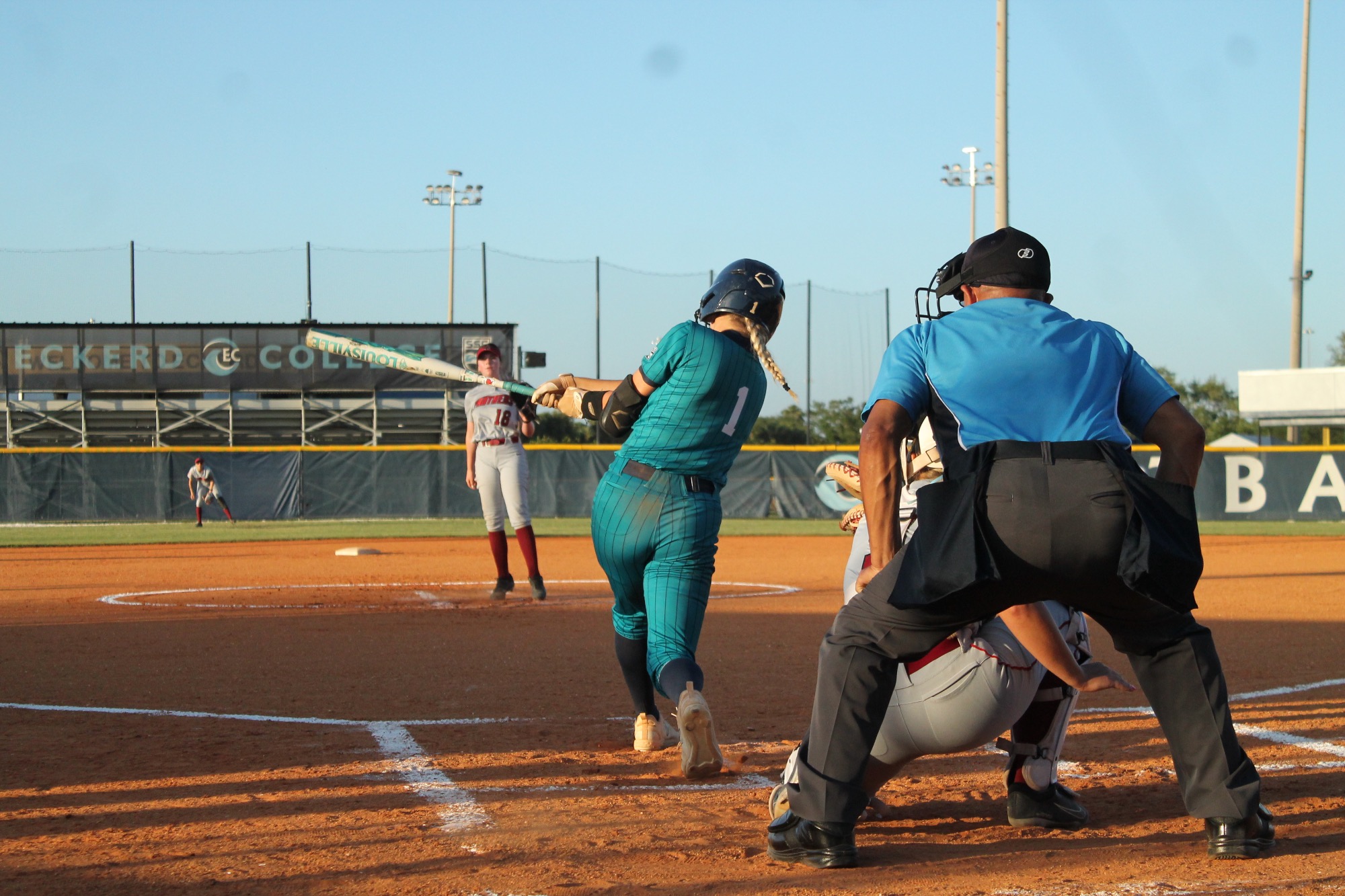 player swings bat
