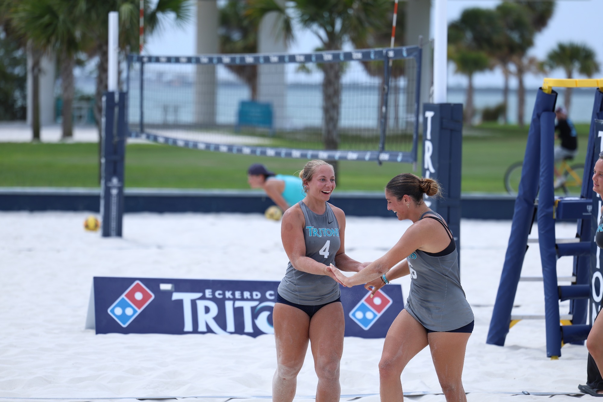 players high five after point 