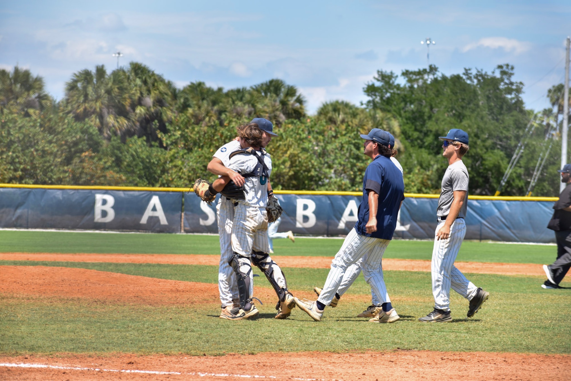 players embrace after final out