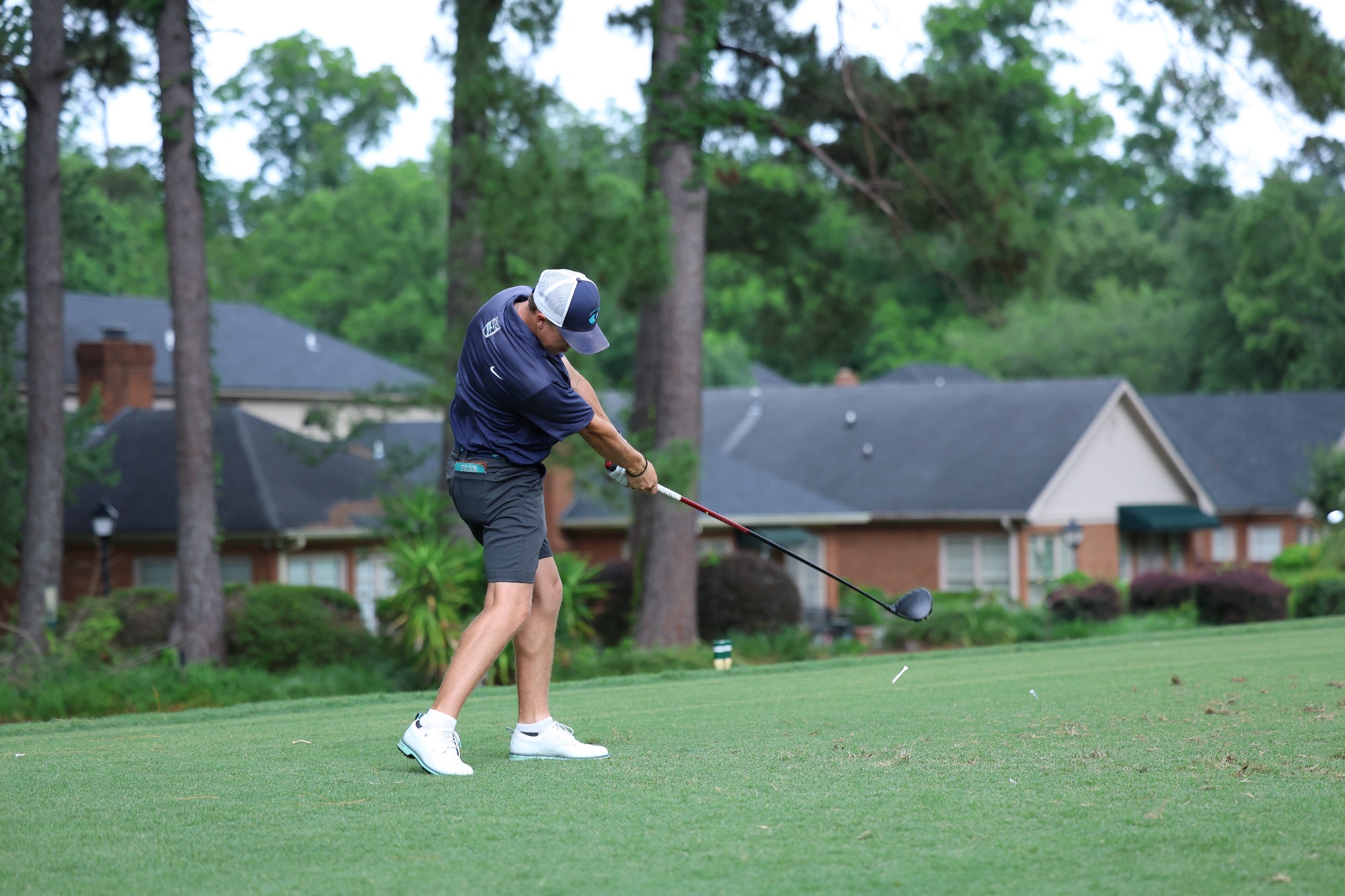Player tees off