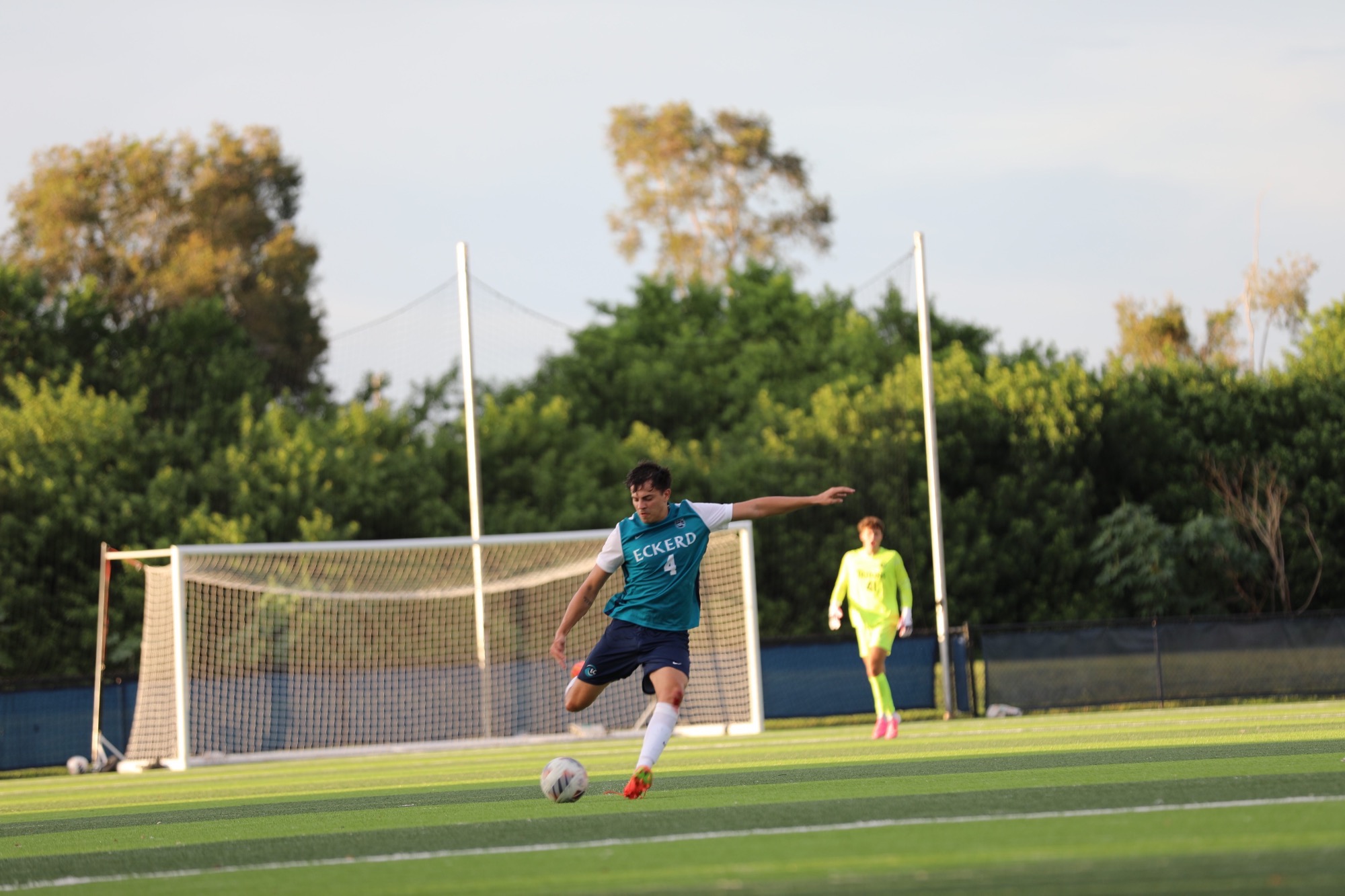 Player kicking ball
