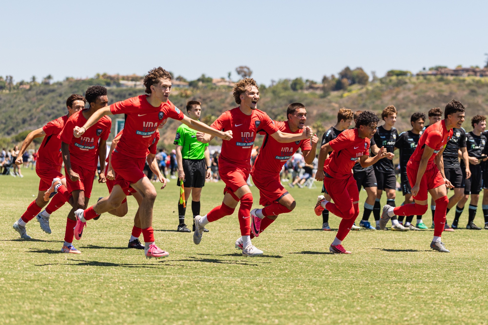 VDA charges the field when celebrating a win in penalty kicks