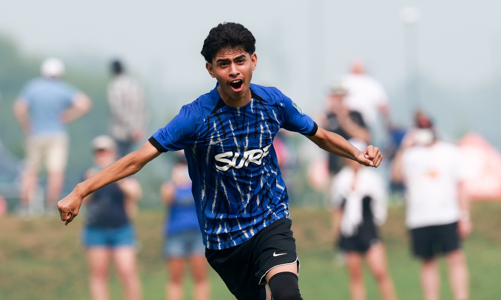 A player celebrates a goal at the ECNL Boys National Finals
