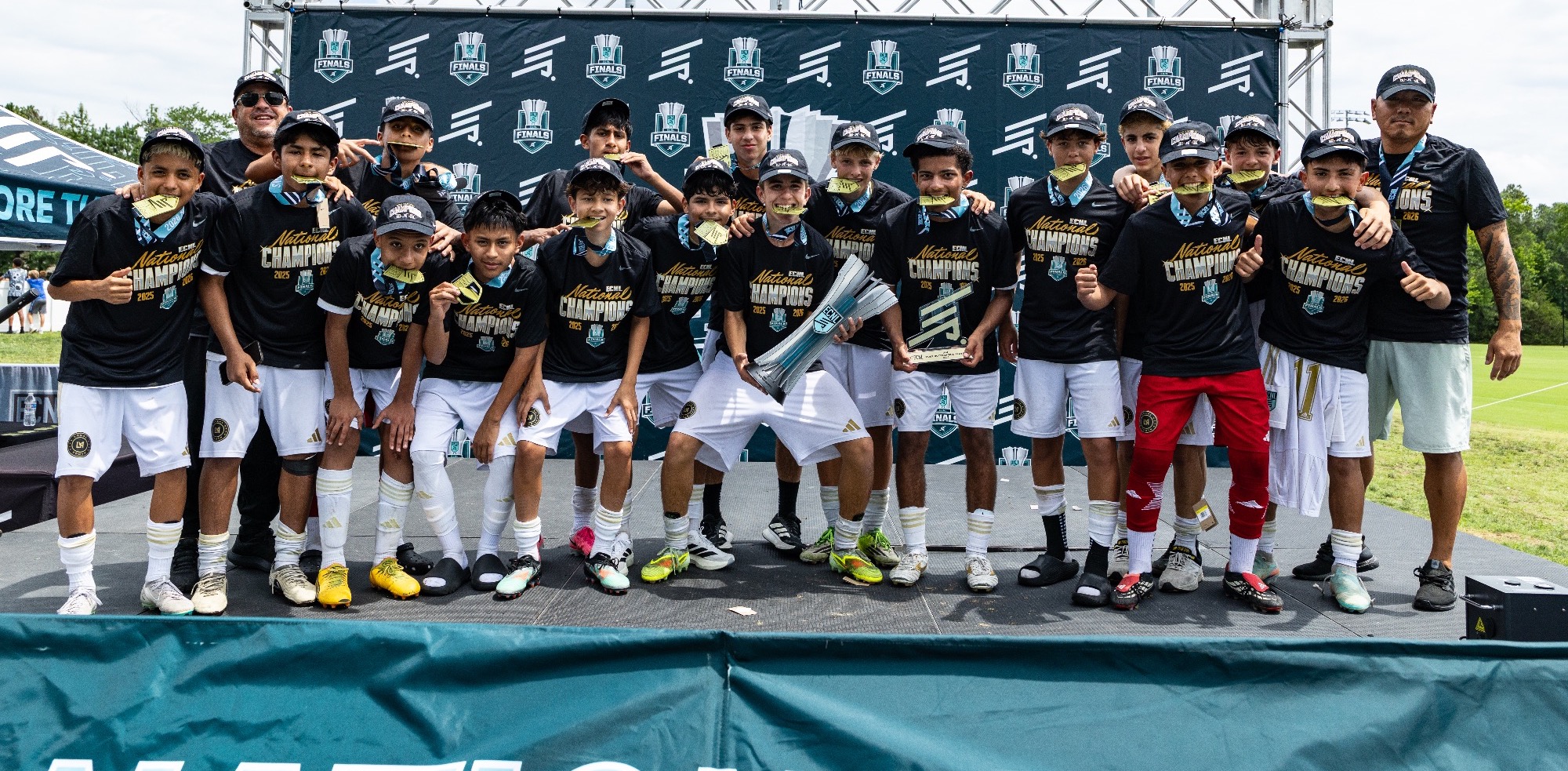 Teams celebrate after winning the ECNL Boys National Championship