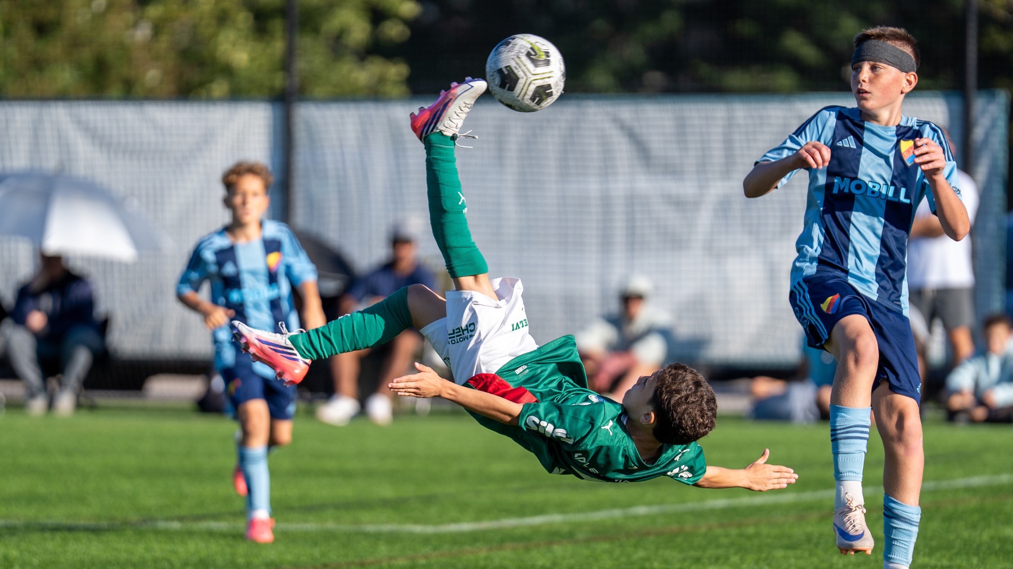 A player for SE Palmerias attempts a bicycle kick at the ECNL International IberCup