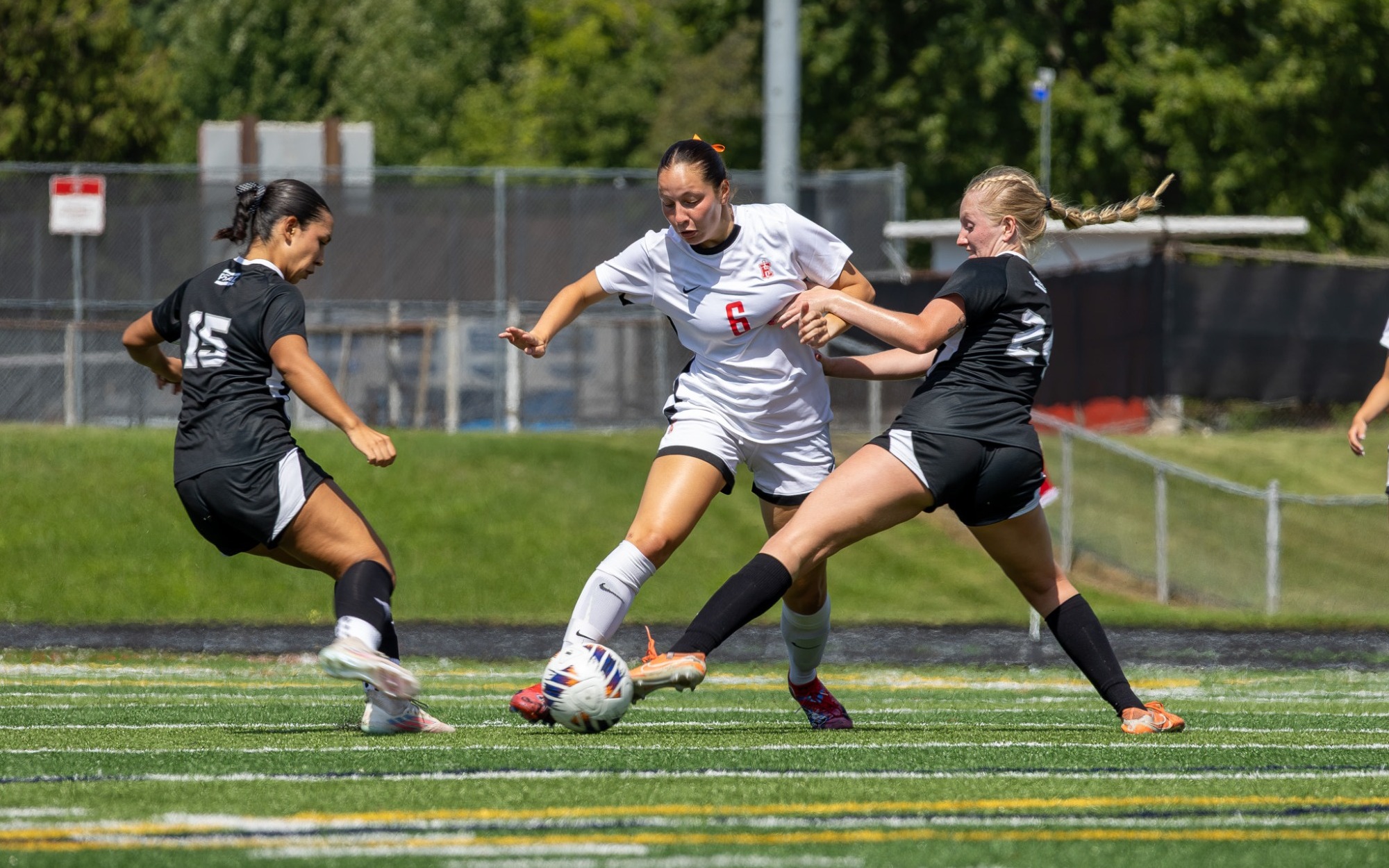 Claire Cacurak dribbles against IUP 