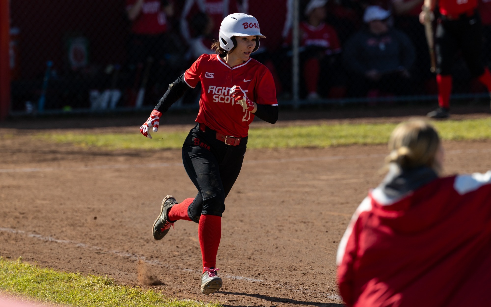 Becker running to first