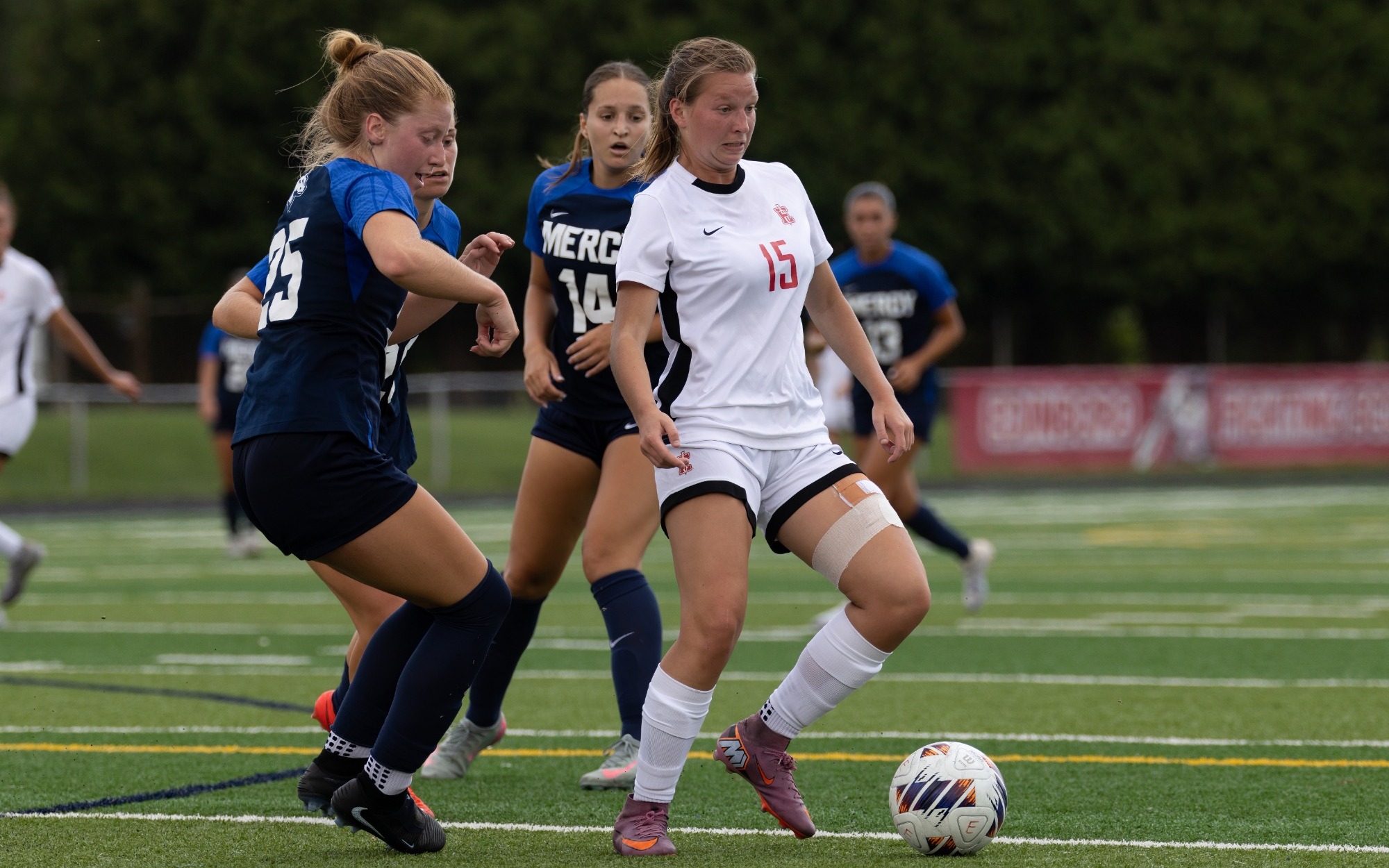 Grace Madison plays the ball vs Mercy