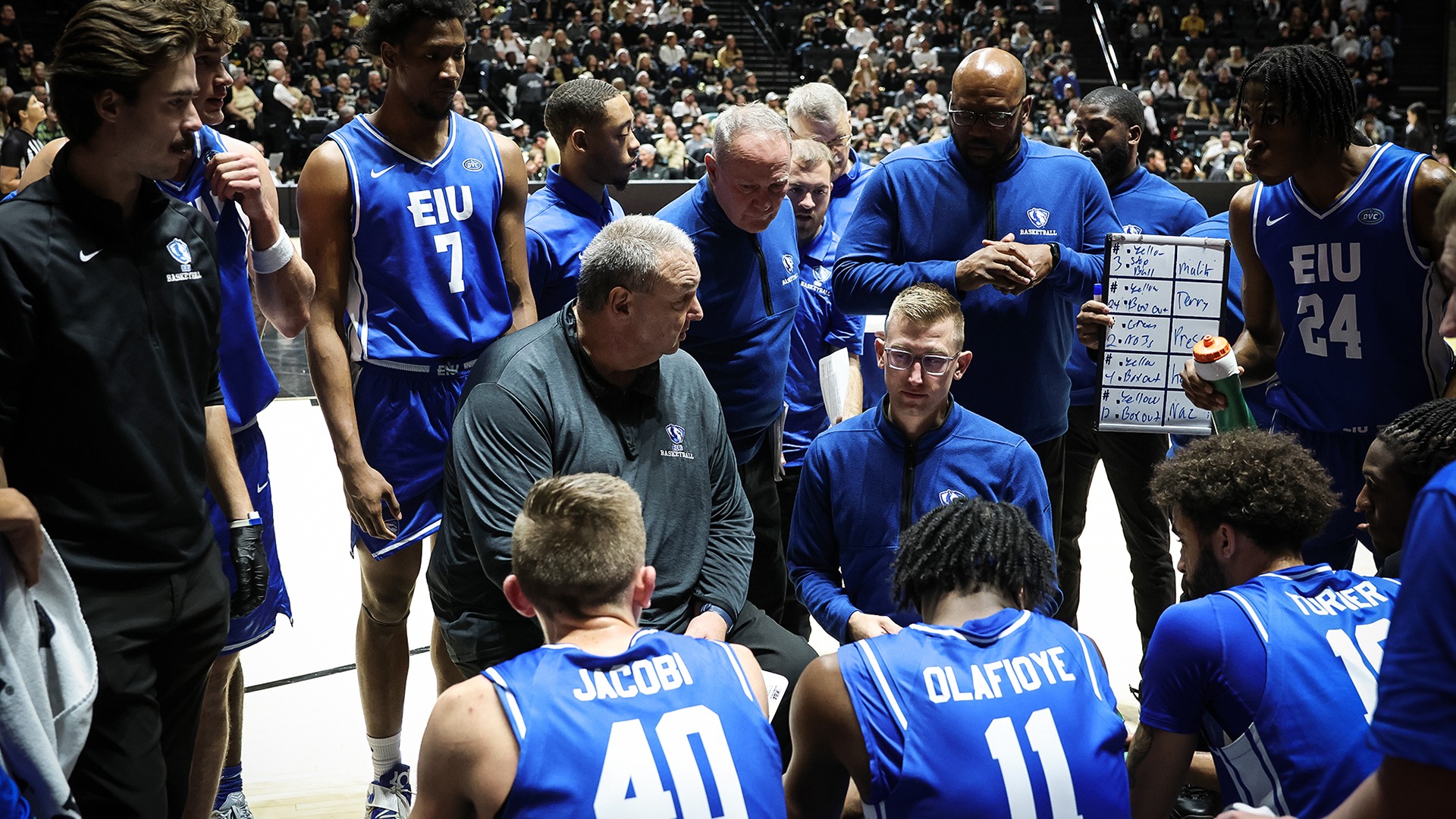 EIU men's basketball team bench at Purdue