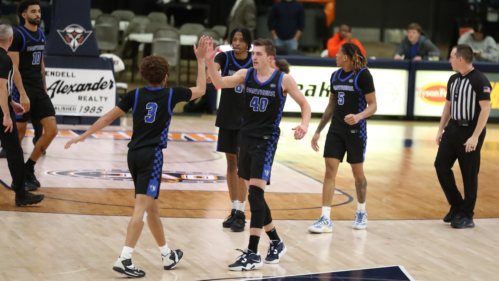 Men's Basketball High Five Coming Off Floor at UT Martin