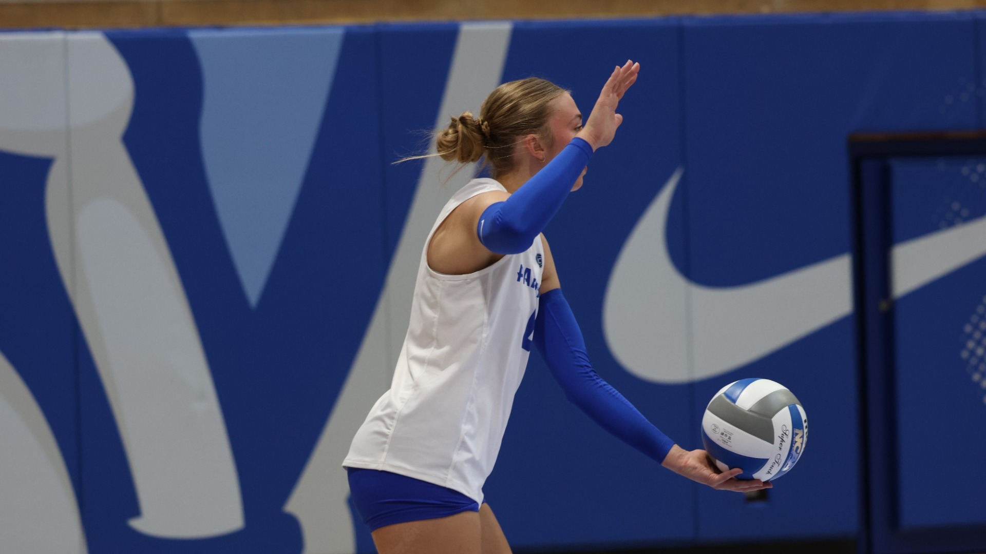 Katie Kopshever serving against Indiana State