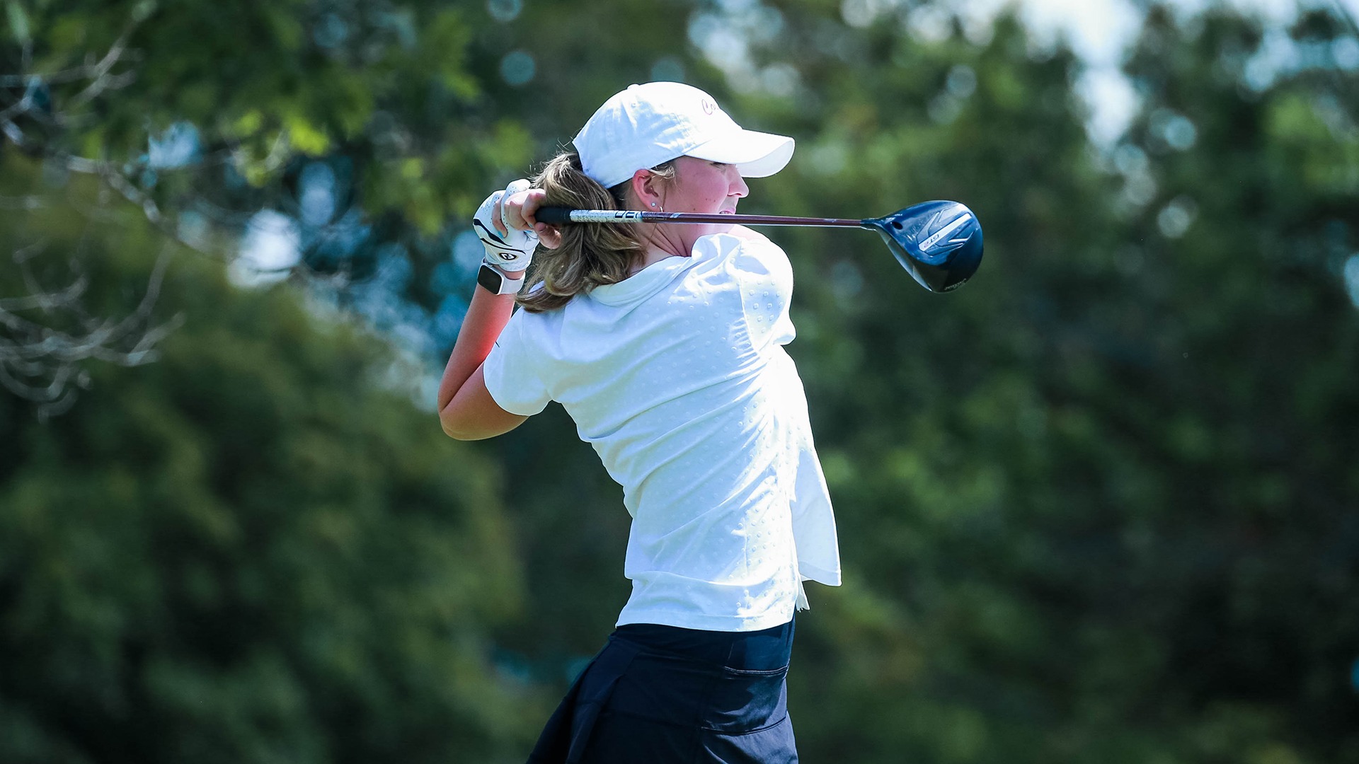 Imogen Jessen follow through after a tee-shot