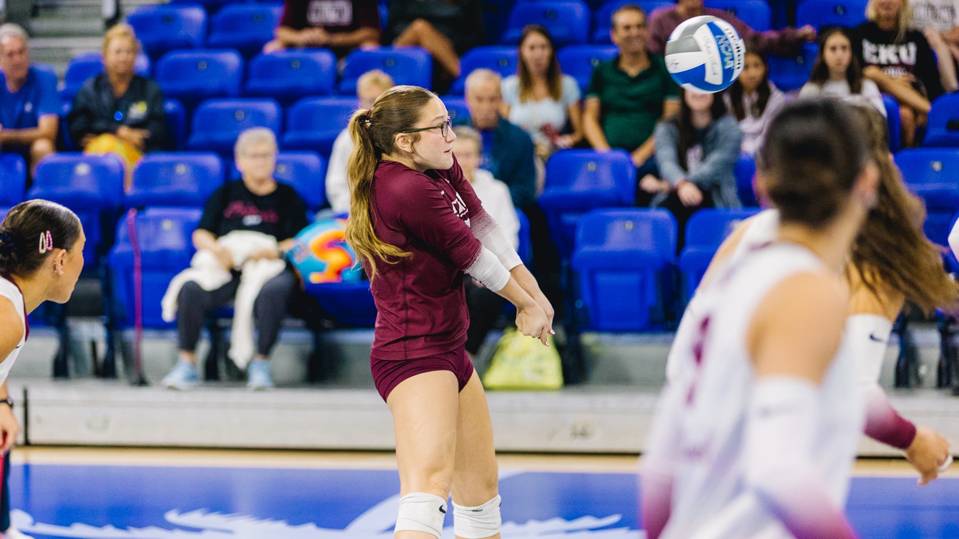 Cassidy Trahan digs the ball against Central Arkansas