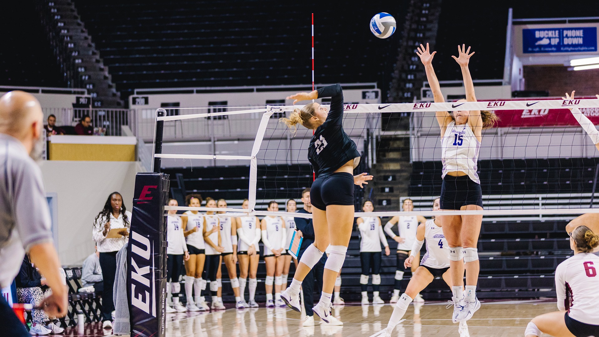 Addison Burke attacks the ball against Abilene Christian