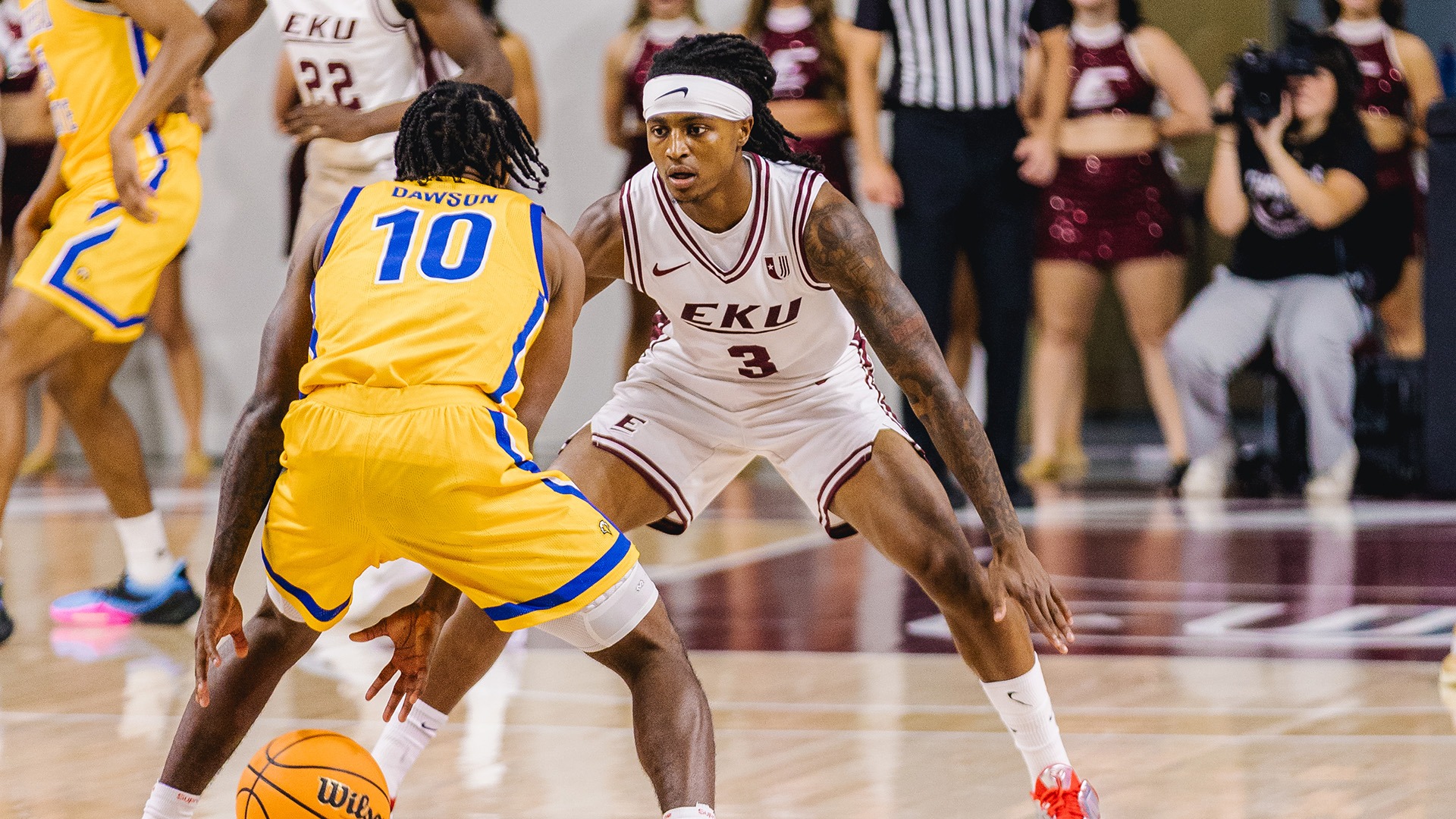 Damone King defends a Morehead State player during an exhibition game