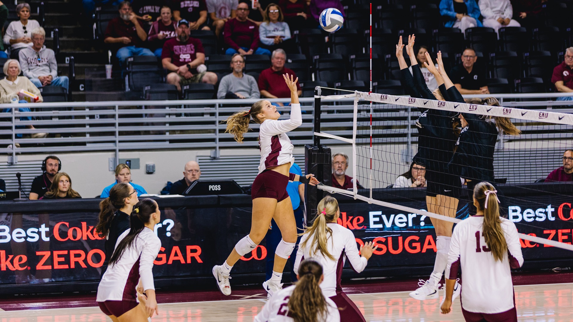 Addison Burke attacks the ball against Little Rock