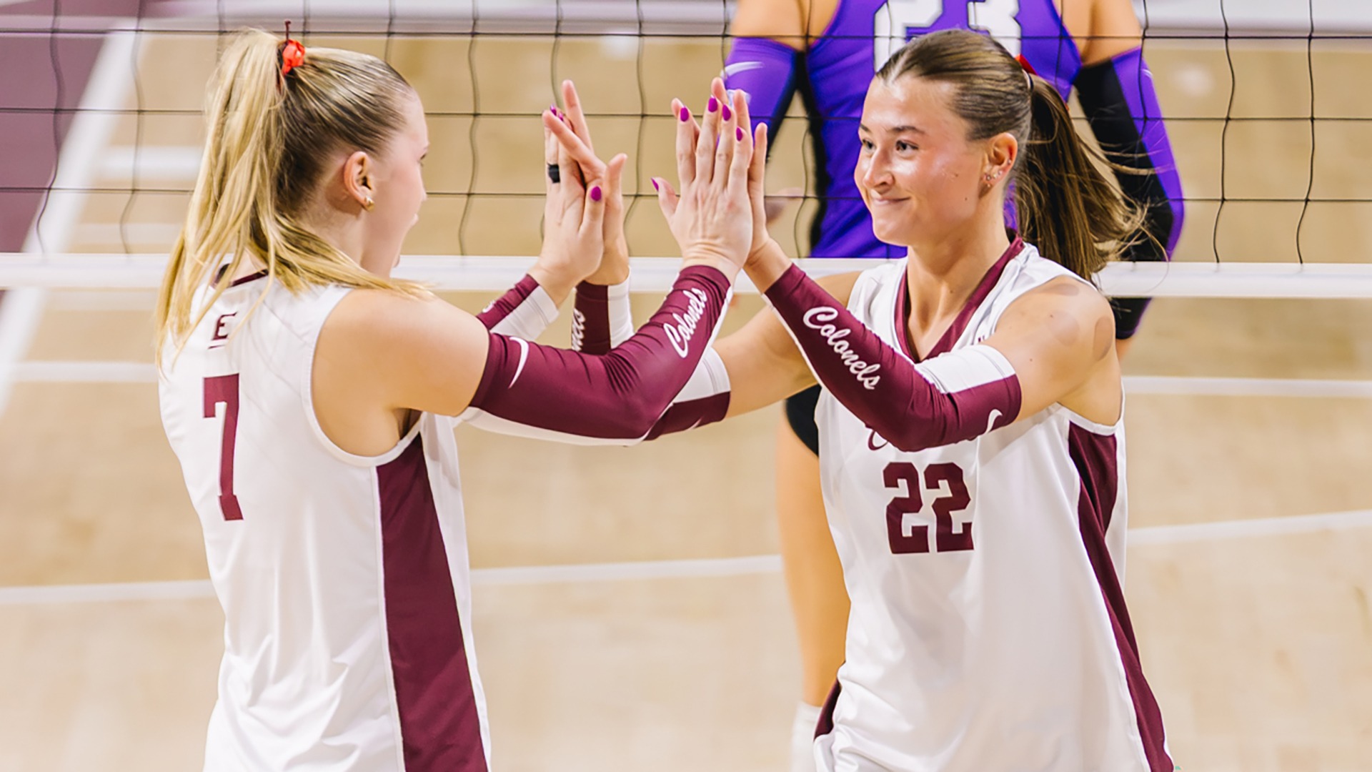 Emilee Hill and Emma Closurdo celebrate a point against Tarleton State