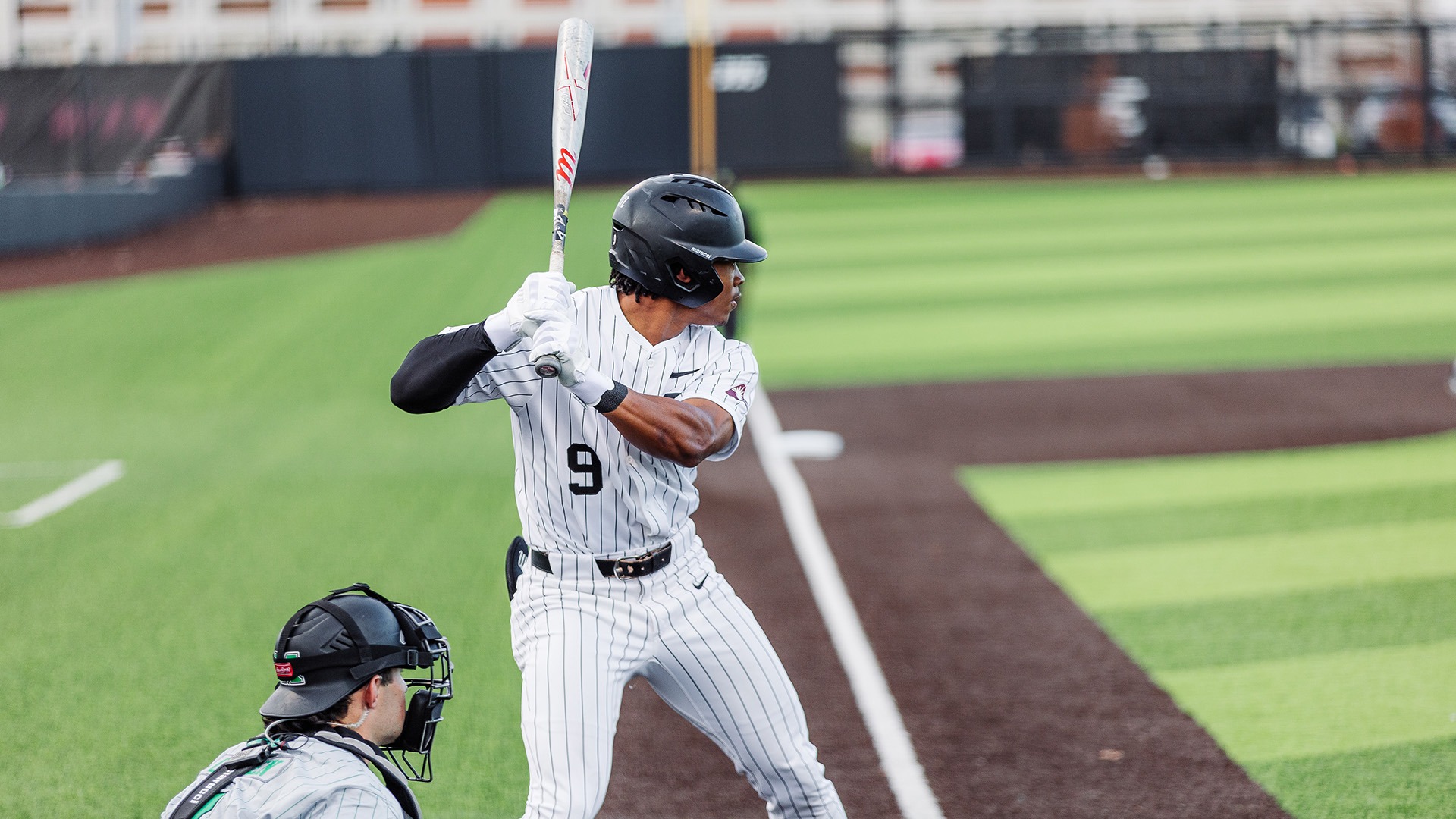 Jay Douglas stands in the batter's box and awaits a pitch