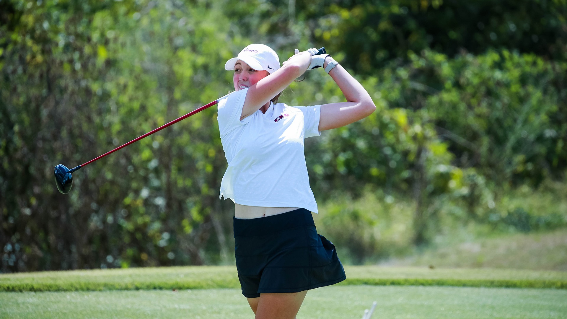 Imogen Jessen tees off on a hole at the University Club at Arlington