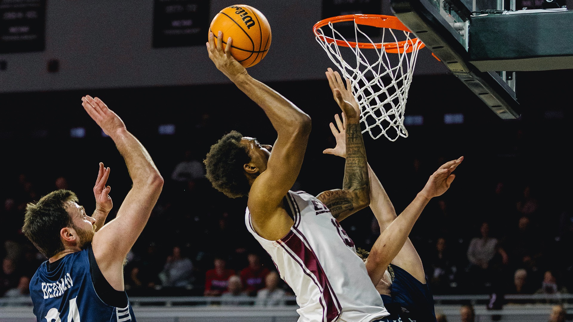 Montavious Myrick puts up a shot near the basket against Queens