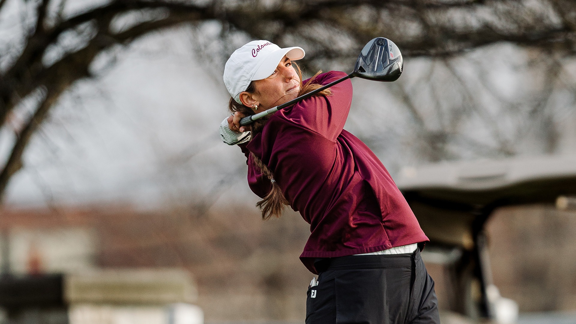 Claira Ramsey Eden completes her swing at the Colonel Classic