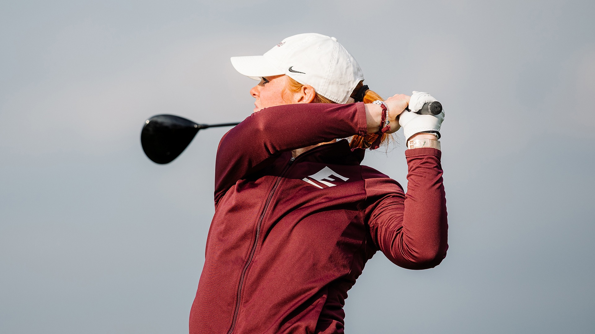 Karra Tucker completes her swing during the first round of the Colonel Classic