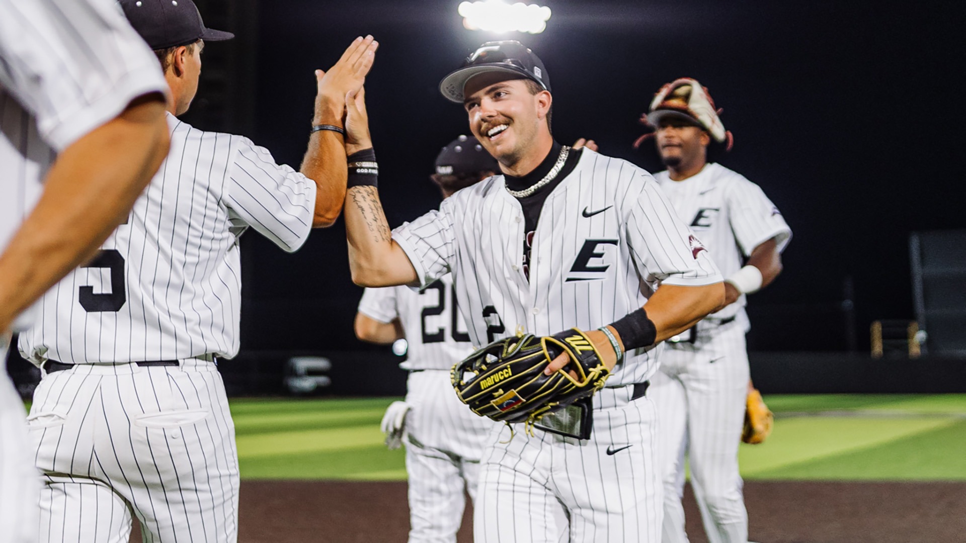 Owen Barger celebrates with Ryan Johnson after EKU's win over Kentucky State