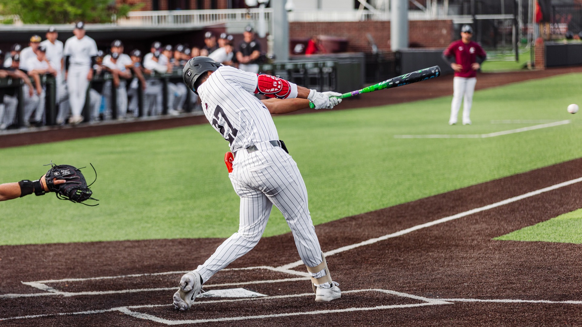 David Alvarez makes contact with a pitch against Western Kentucky