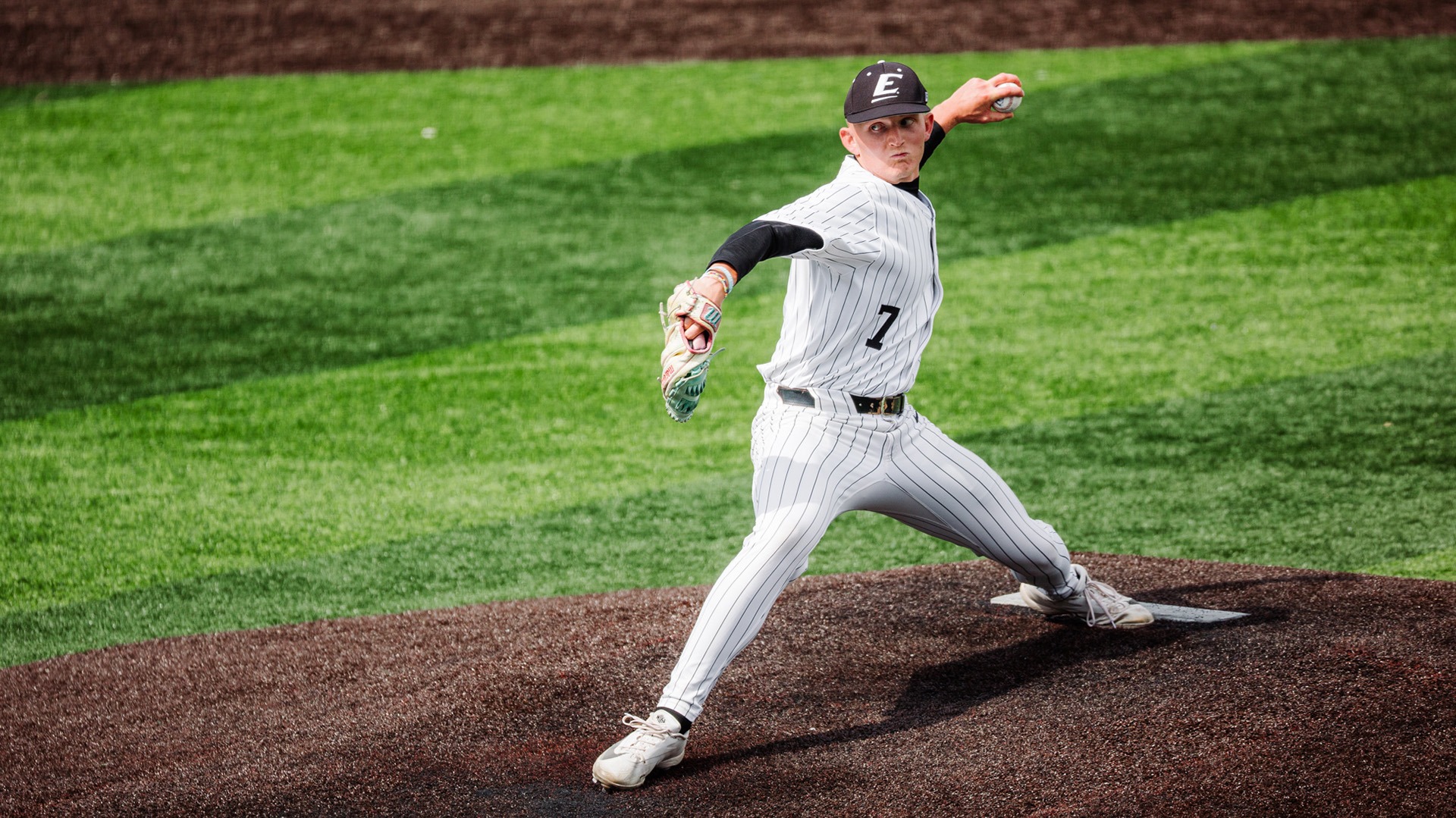 Gavin Faulkner delivers a pitch against Louisville