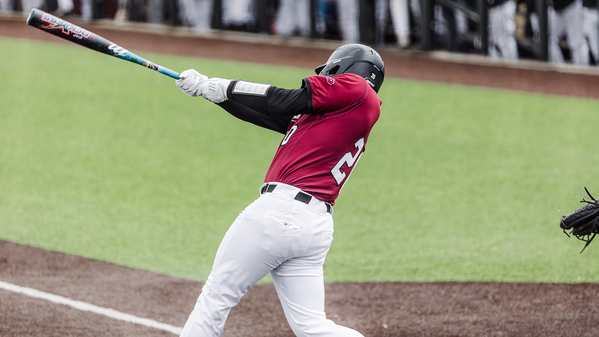 Ricco Longo swings at a pitch against Lipscomb