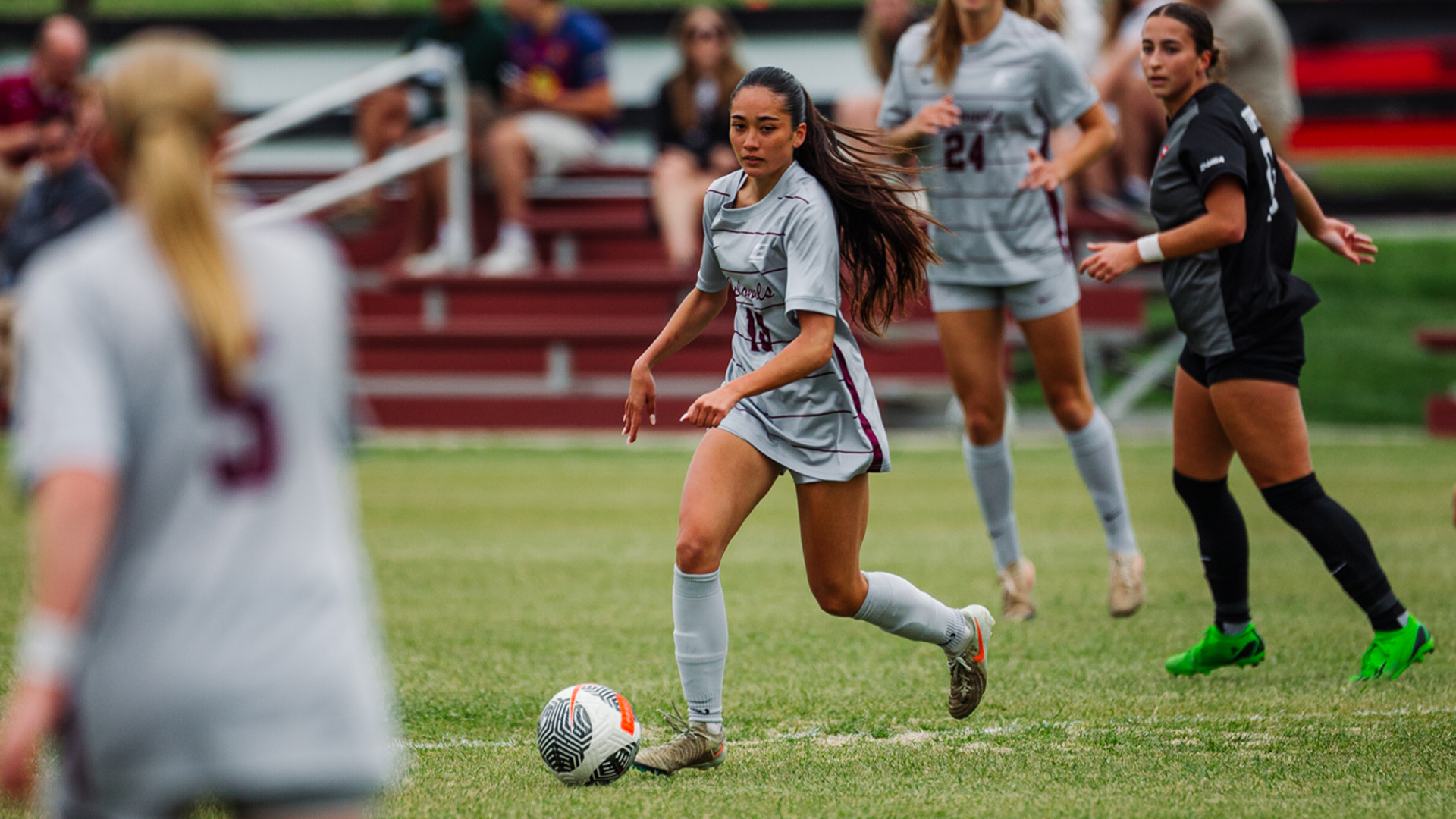 Emma Wolf Dribbling Soccer Ball vs. WKU
