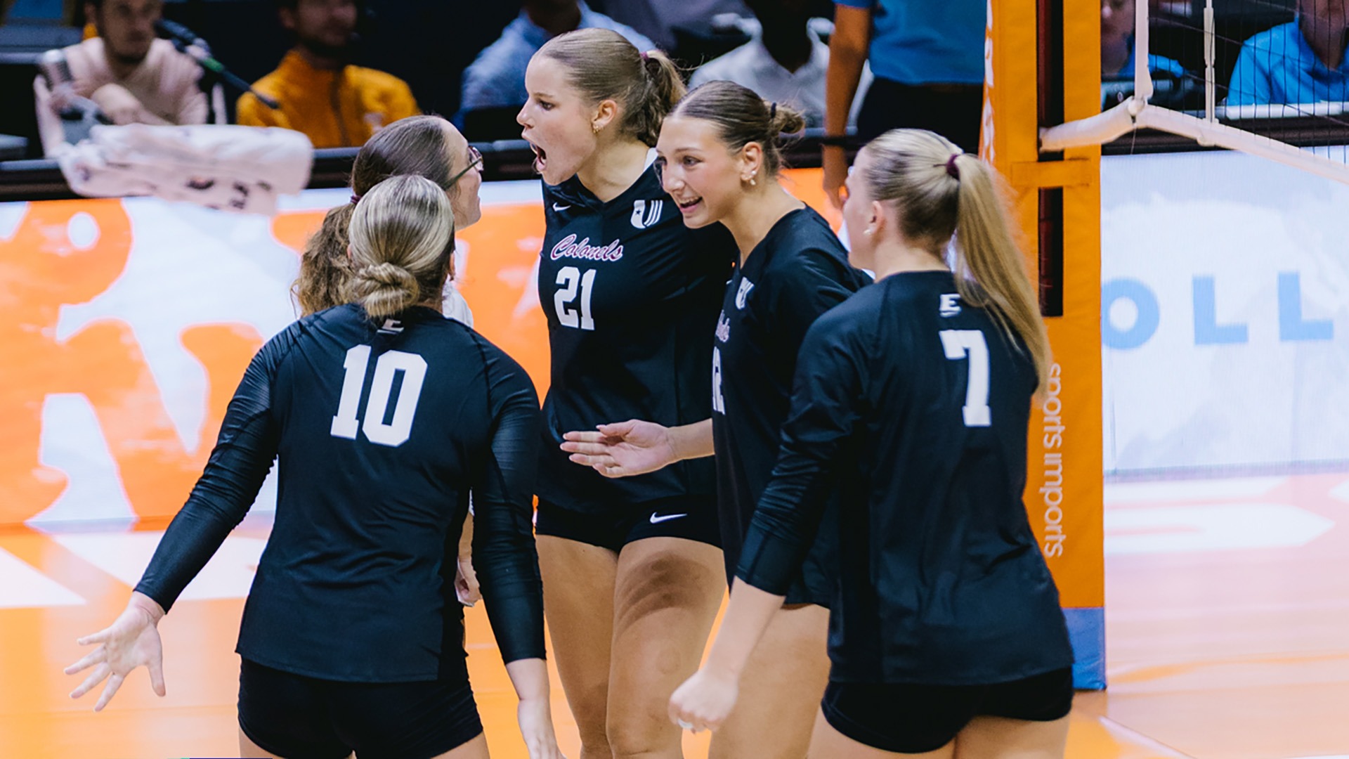 The Colonels celebrate after winning a point in a match at Tennessee