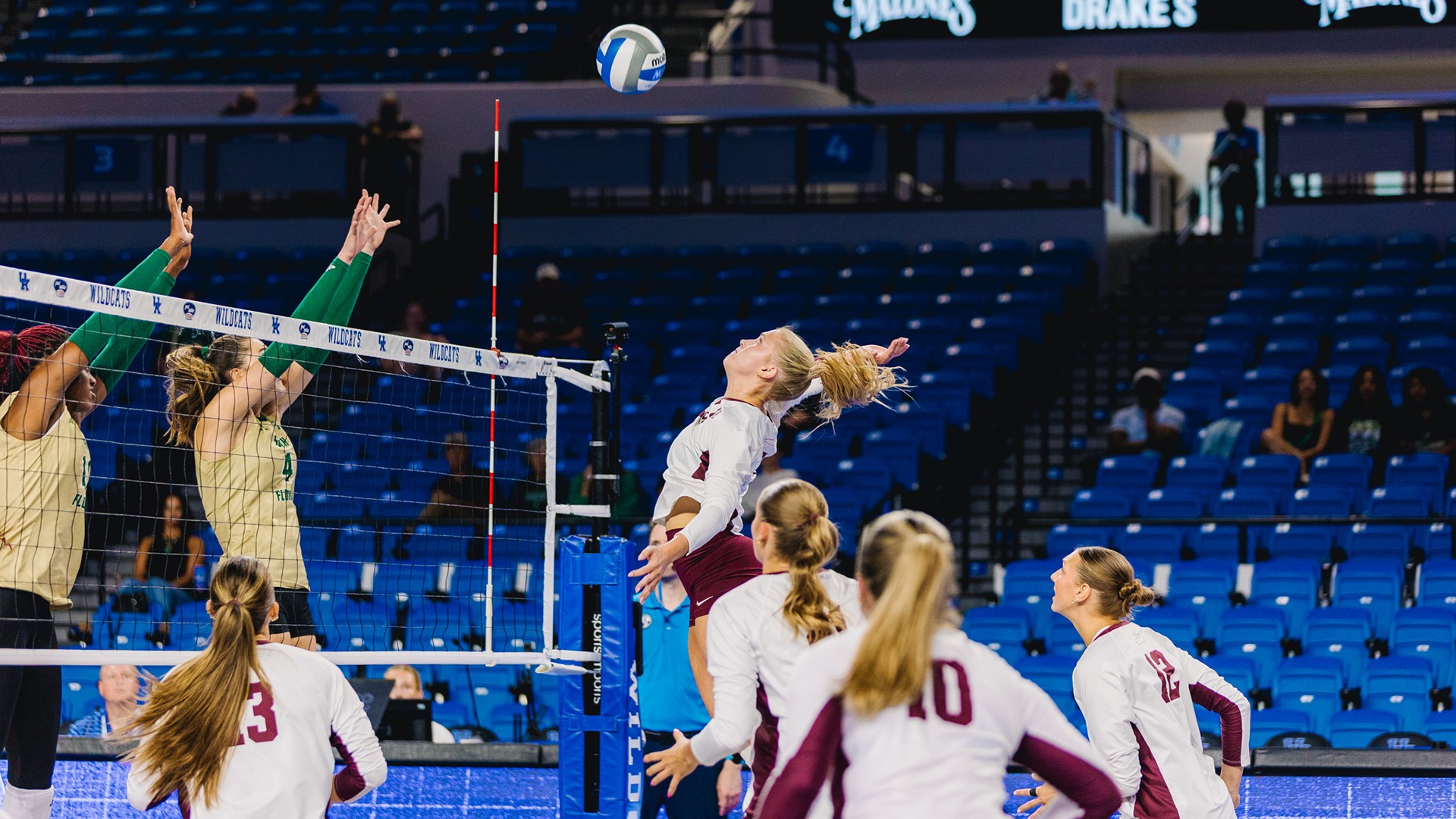 Emilee Hill with an attack against South Florida