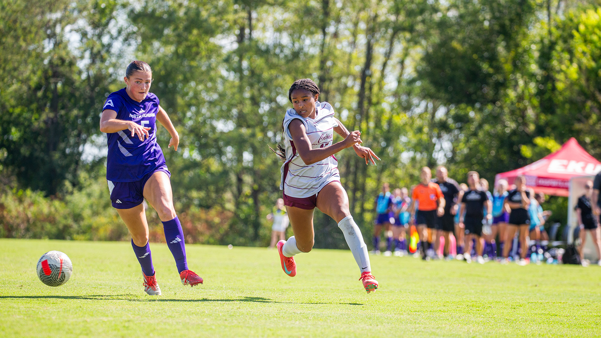 Rachel Phifer dribbling soccer ball against North Alabama