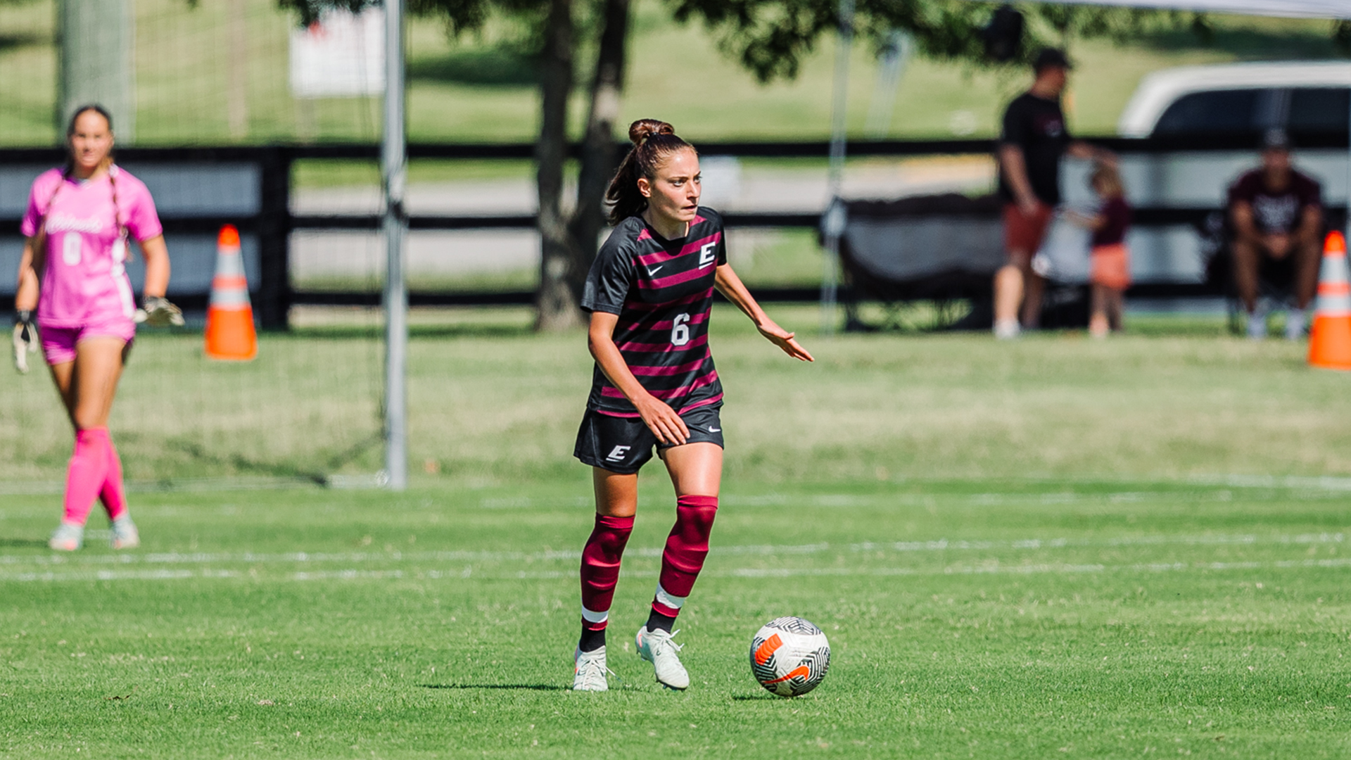 Chiara Premoli dribbling ball upfield during 2026 season