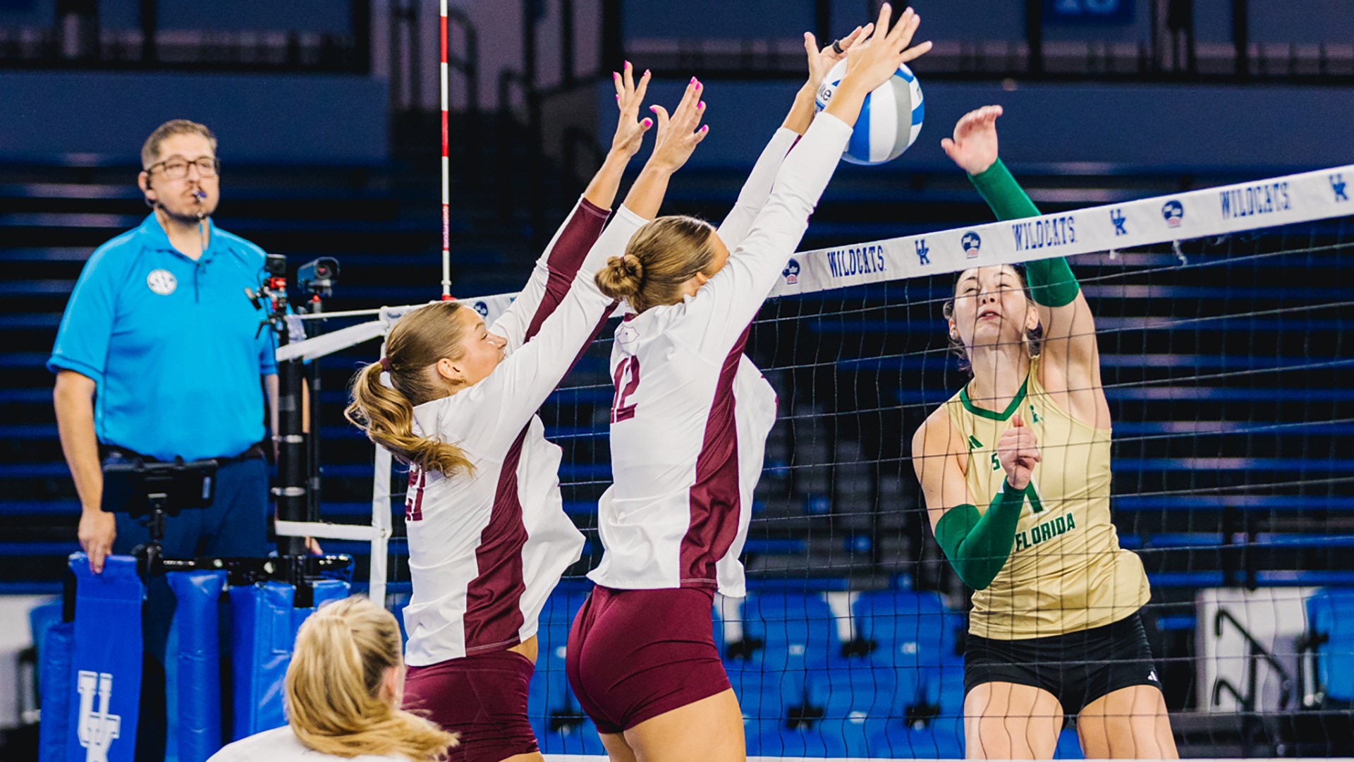 Caitlyn Flees blocks the ball against South Florida
