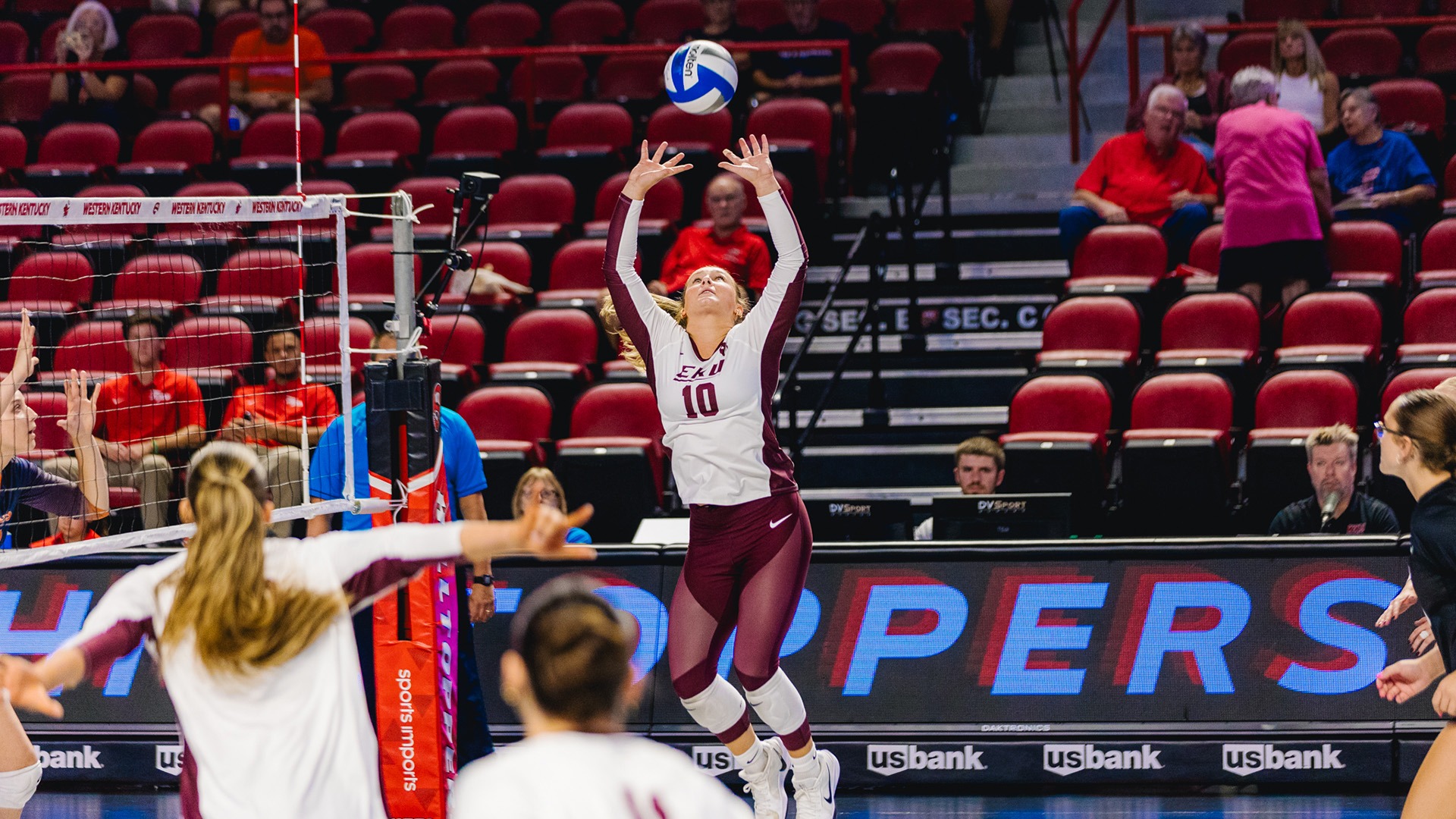 Cooper Abney sets the ball against Pepperdine