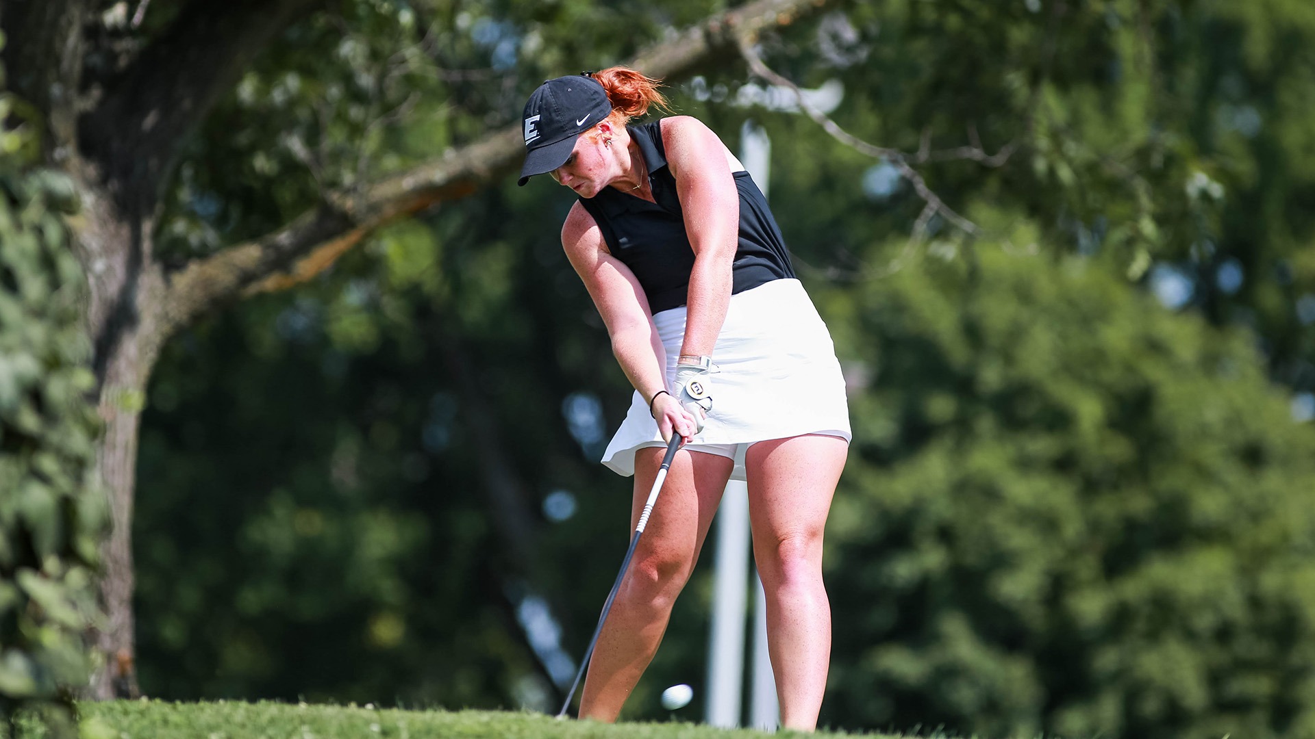 Karra Tucker tees off at the University Club at Arlington