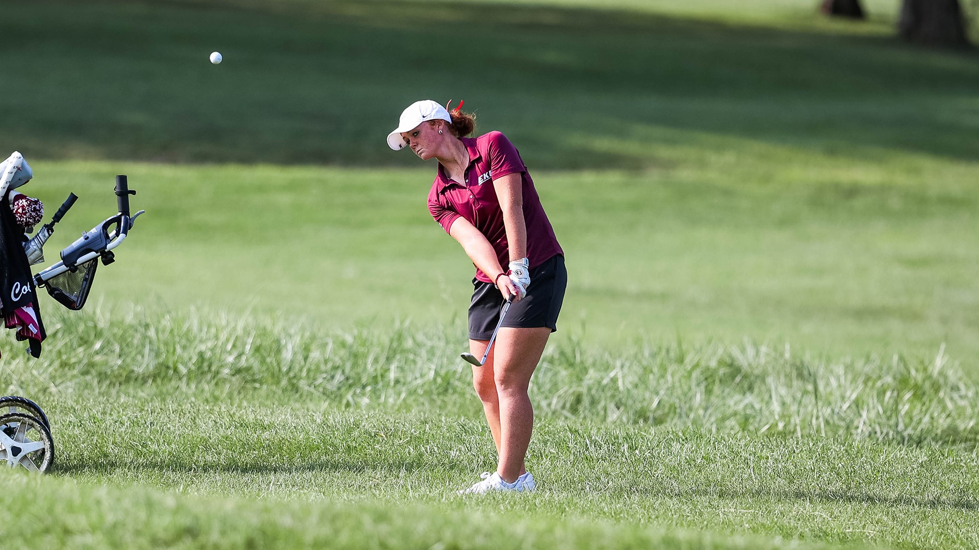 Karra Tucker chips a shot during the Bettie Lou Evans Invitational