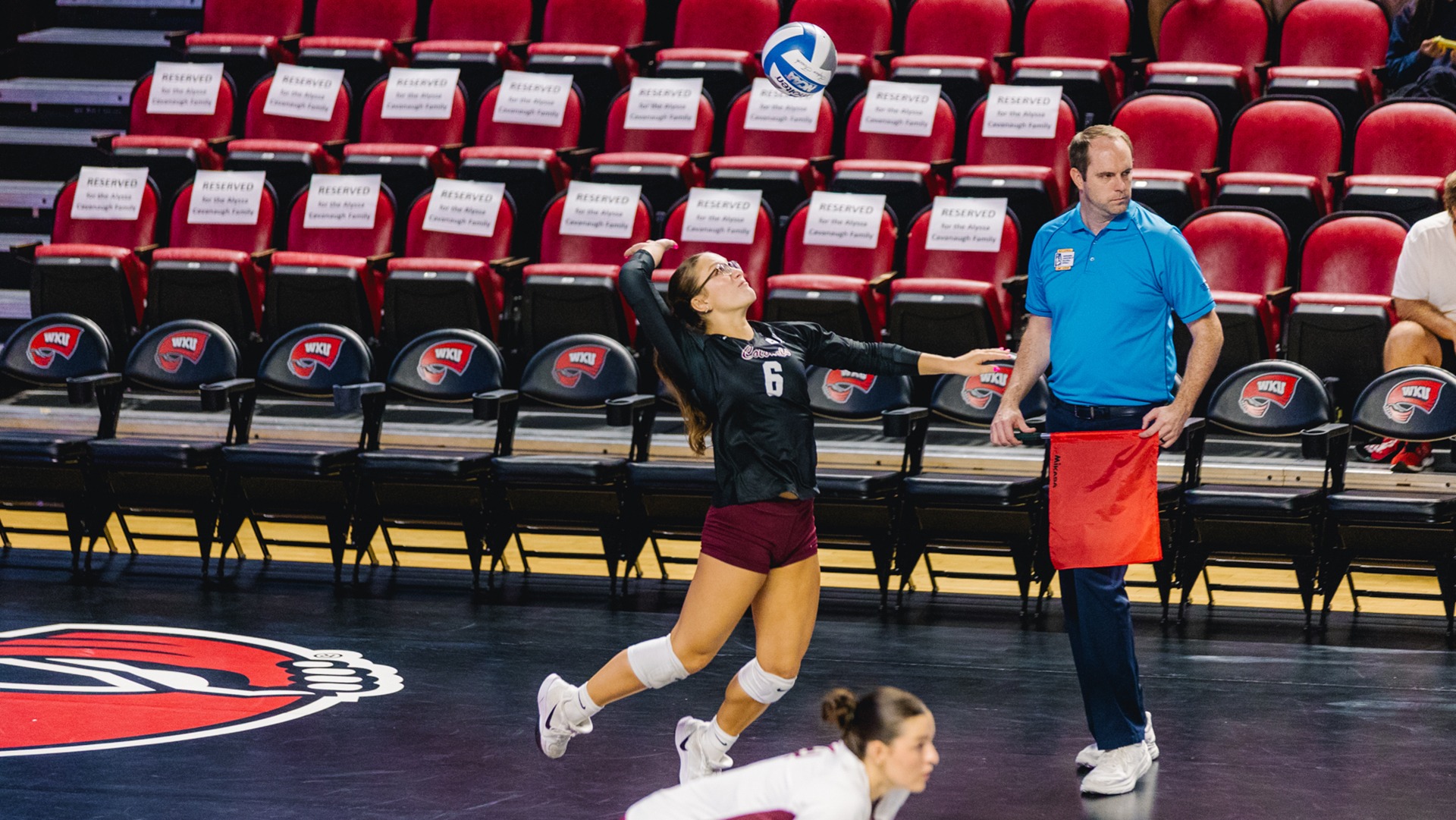 Cassidy Trahan serves the ball against Pepperdine