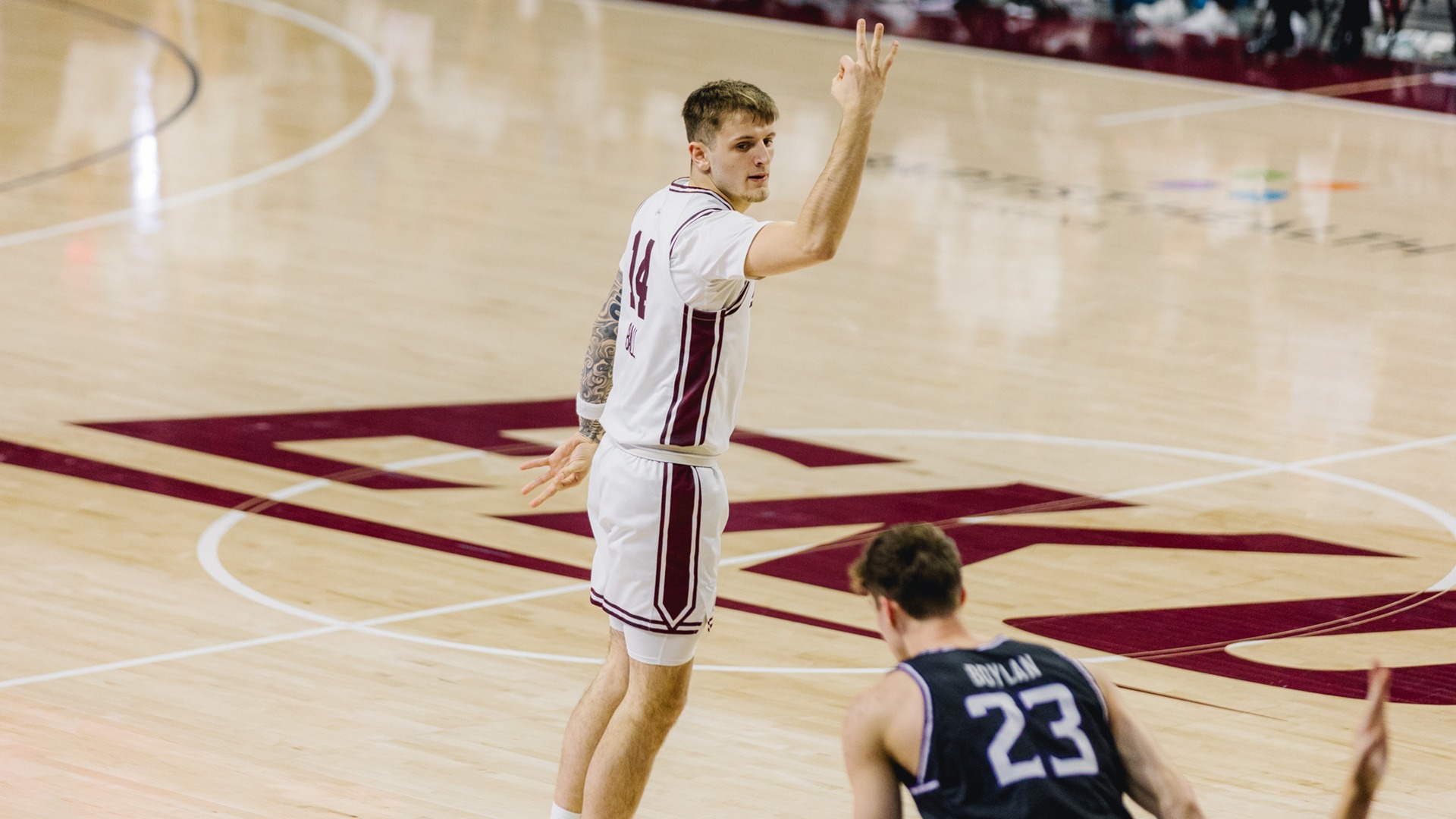 Austin Ball celebrates a 3-pointer against Lipscomb